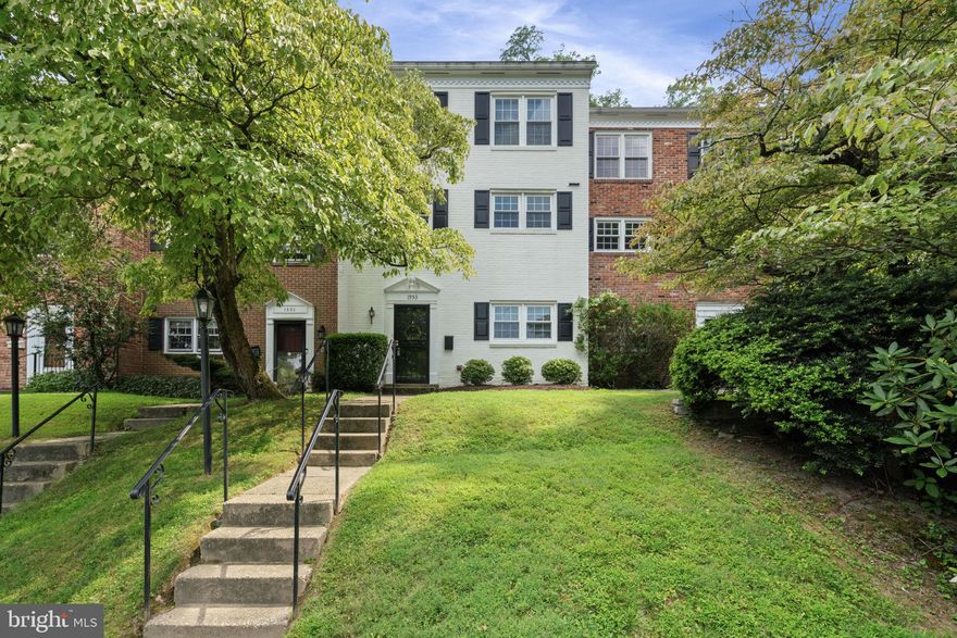 LOCATION, LOCATION, LOCATION!  Welcome to this wonderful all brick 3-bedroom, 2-1/2-bath townhome, with updated bathrooms. The main living area welcomes you with an open light-filled living/dining room with fireplace and sliding doors to spacious patio and private fenced backyard - perfect for entertaining. Hardwood floors throughout the main living area and upper levels. Entry level features carpeted recreation room with fireplace and built-in shelving and cabinets, and also a large finished laundry room with plenty of storage space. In the private fenced backyard, there is a newer retractable awning over the patio. 2 assigned (unmarked) parking spaces are located conveniently and directly in front of the home. There are more open unassigned parking spaces in the vicinity of the townhome for guests when needed. Minutes to DC, shops and restaurants of McLean, Falls Church and Tysons Corner. Less than 10 minutes to both West Falls Church and McLean Metro stations and 30 minutes to two major airports.