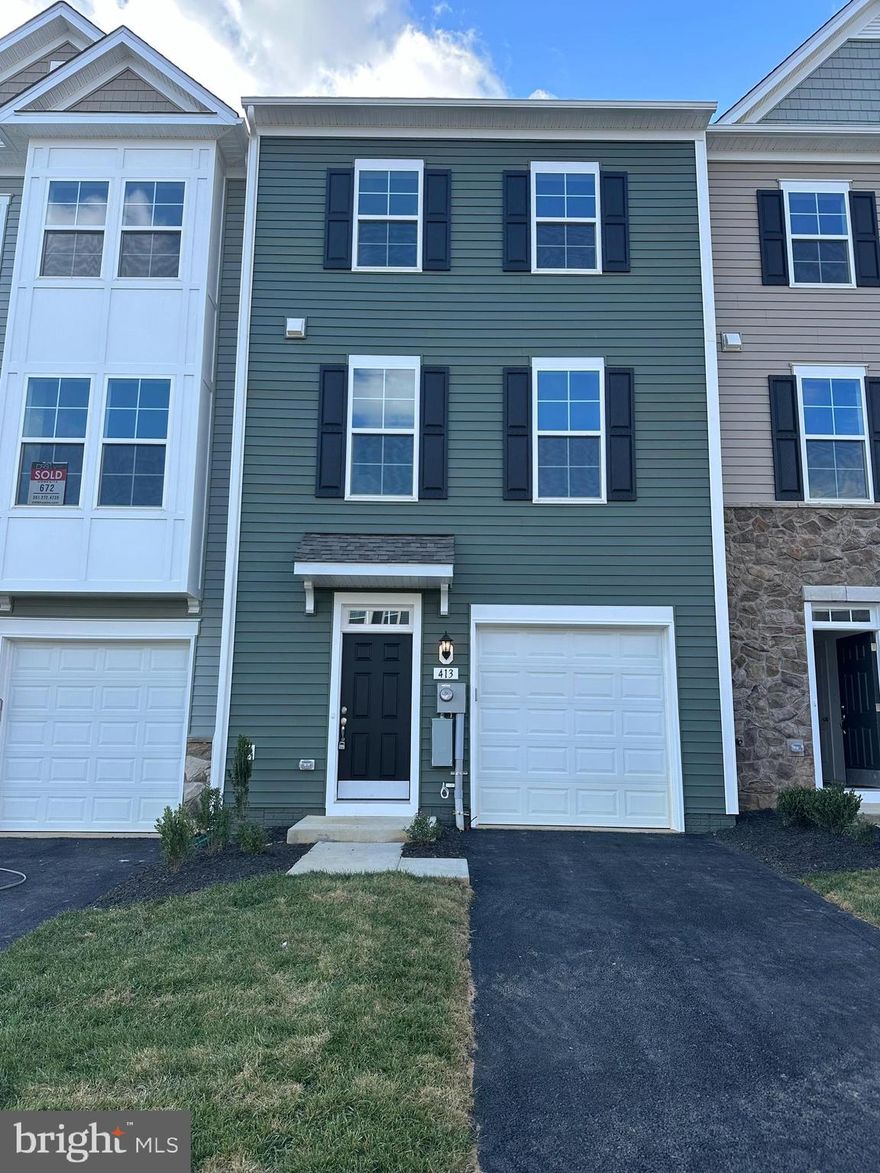 Be the first to call this beautiful new build townhome yours. Enjoy access to a clubhouse, swimming pools, walking trails, lush landscaping, and stunning mountain views.

The Bedford II is a beautifully finished 3-level townhome with a 1-car garage. It includes 3 bedrooms and 3.5 baths, featuring a covered front porch, a spacious foyer with a double coat closet, and a finished rec room with a full bath and stand-up shower.

The foyer boasts a boxed oak staircase leading to an open-concept main level, which includes a dining room with a rear box bay extension, a kitchen equipped with stainless steel appliances, upgraded level 2 cabinets, quartz countertops, and a convenient powder room.

The primary suite offers a vaulted ceiling, a large walk-in closet, a dual vanity, and an oversized shower with a seat. Laundry facilities are conveniently located on the bedroom level, along with 2 additional bedrooms and a full bath featuring a tub/shower combination. Landlord is installing new water softener. Landlord will provide and change salt in water softener when needed. Landlord will be providing washer and dryer and faux wood blinds. Trash is included in rent. Landlord covers HOA. NEW DECK will be added by the end of December!