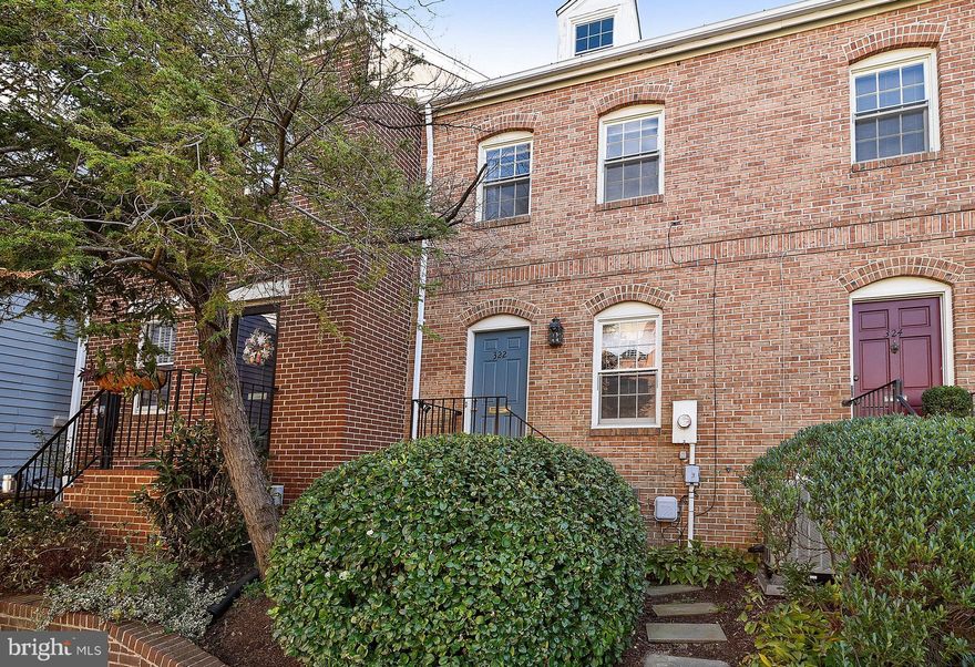 Lovely brick townhouse near King Street Metro with off-street parking.  Features living room with fireplace, hardwood floors, unfinished third floor with rough-in plumbing, electric, heating and cooling. Instant Equity!  Rear Patio and fenced backyard.  Great location, close to shops and restaurants, King Street Metro and Whole Foods.