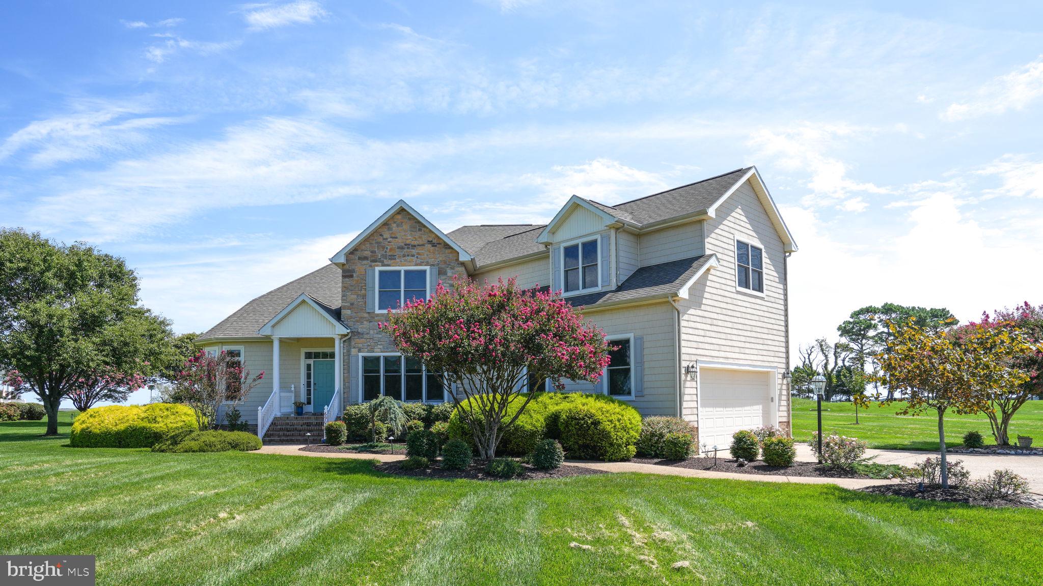 Wake up to sunrises over Assateague, moonrises across the Sinepuxent Bay, and rainbows after summer storms. This rare Rum Point property offers unobstructed views, direct bay access, and a community dock for boating, kayaking, or paddleboarding. Inside, recent upgrades include a rebuilt master spa bath, modernized kitchen, hardwood floors throughout, newer HVAC, smart switches, thermostats, and all-LED lighting. The home is meticulously maintained and fully move-in ready. The expansive rear deck with custom bench seating frames golf course greens, open bay waters, and endless sky. Key features include panoramic water and golf views, direct bay access, community dock, upgraded interiors, and low-maintenance ownership. More than a home, this is a lifestyle - one of the Eastern Shore's most unique and desirable waterfront opportunities.