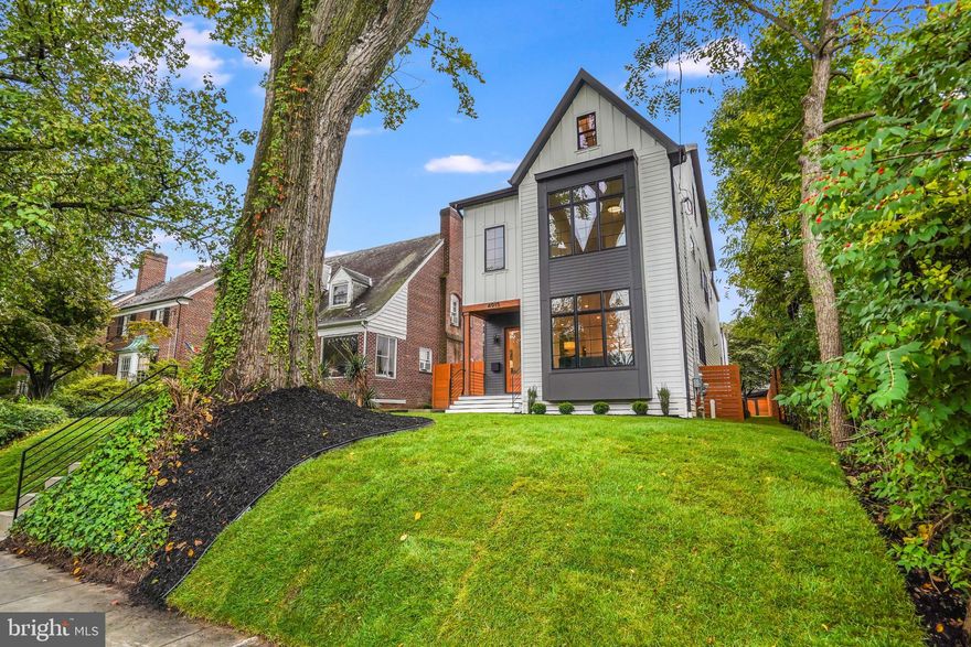 Welcome to 4915 Western Avenue NW, a stunning new construction single-family home located in the highly sought-after neighborhood of American University Park. This masterfully designed & impeccably finished 4-level residence boasts a 2-car garage & a separate guest house, offering over approximately 5,500 square feet of luxurious living space.

As you step inside this exceptional home, you'll immediately be captivated by the exquisite attention to detail & craftsmanship that sets it apart. The main level greets you with soaring 10-foot ceilings, warm wide plank wood floors, & an abundance of natural light streaming in through large Pella Casement windows with elegant transoms. The living room is adorned with an impressive stone fireplace feature, creating a cozy & inviting ambiance.

The dining space, centrally located on the main level, is elegantly illuminated by designer lighting & flows seamlessly into the butler's pantry, featuring stunning countertops with porcelain backsplash. A sliding door opposite the butler's pantry leads into a generous kitchen pantry, offering exceptional storage solutions.

The gourmet kitchen is a true masterpiece, showcasing luxurious countertops & cabinets, a substantial island with a waterfall edge, & top-of-the-line Thermador stainless steel appliances, including a commercial-grade 48" gas range with dual ovens as well as additional wall ovens, including a speed oven/microwave. This home is replete with built-in features, stylish lighting, & porcelain accent walls, all contributing to the home's quality & character. The home's cabinets have been finished with LED lighting, both under them & inside the array of glass cabinets, providing a modern & aesthetically pleasing addition to interior design. These LED lights serve both functional & decorative purposes, enhancing the overall ambiance of the rooms while providing practical illumination.

The spacious yet cozy family room is a focal point on the main level, featuring dramatic black French slider patio doors that open to the outdoor space, allowing for seamless indoor-outdoor living & entertaining.

Venturing to the second level, you'll discover four generously sized bedrooms & three full bathrooms. The main bedroom suite is a true retreat, boasting two walk-in closets with upgraded closet systems & an en-suite bathroom that rivals a spa-like oasis.

Ascending to the third level, you'll find a versatile loft space that includes a large bedroom area with cathedral ceilings, a luxurious full bathroom, & a spacious living area with a vaulted ceiling & a wet bar. This living area leads to a 340-square-foot terrace, perfect for relaxing & taking in the surroundings.

The walk-up lower level offers another level of living space, featuring a large recreation room centered around an elegant wet bar with built-ins, a wine & drink refrigerator, & a glass-enclosed wine storage. Additionally, there's a luxurious full bathroom & an additional bedroom on this level. Separate media room is wired for 5.1 surround sound with speakers installed & is wired for cable and internet. 

Outside, just across the patio, you'll discover the two-car garage with stairs leading up to a fully finished 500+ square foot versatile living space, complete with a full bathroom.

This exceptional home also includes built-in speakers throughout, a Nest system, & a Ring system, ensuring your comfort and peace of mind. You will find internet access points & wiring for cable & internet throughout. 

Enjoy the convenience of this desirable location, with easy access to numerous parks & less than a mile from the Friendship Heights Metro station & all its surrounding shops and dining options. Plus, it falls within the Janey/Deal/Jackson Reed school boundary. Don't miss the opportunity to make this luxurious new construction property your dream home in American University Park!