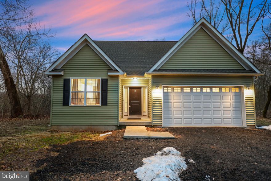 Welcome to 588 Almshouse Road in Doylestown Township!  A a spacious and thoughtfully designed 3 bedroom 2.5 bath single family home offering plenty of comfortable living space with the convenience of first floor living.  The main level features an open concept with a dining room/living room combination.  The kitchen has granite countertops, recessed lighting and stainless steel appliances.   The first floor primary bedroom suite, complete with a primary bathroom, provides both comfort and accessibility.  Upstairs you'll find two generously sized bedrooms and a full bathroom.  The potential to add a 3rd bedroom upstairs exists behind the hall wall.  A walk-in attic is located in one of the bedrooms.  Off of the living room is a rear deck that is ideal for relaxing and enjoying the private backyard setting.  The large unfinished basement provides incredible potential  that could be finished to add on to your current 2300+ sq ft of living space.  As an added benefit, a brand-new driveway will be installed prior to settlement, giving the property a fresh and welcoming entrance.  Schedule your showing today before this one is gone!