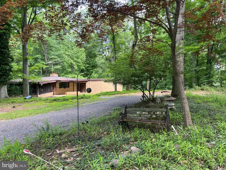 Unique Investment Opportunity – Total Rehab on 2.76 Acres in Ellicott City
All-brick custom rancher nestled in a private wooded setting and backing to a serene stream. This rare gem offers 2.76 acres of secluded land in the heart of Ellicott City—perfect for investors, builders, or visionaries ready to bring their dream home to life. The property requires a full renovation, including installation of a kitchen and bathrooms, but presents endless possibilities for the right buyer to create a one-of-a-kind retreat or potentially subdivide (buyer to verify with county). 

With solid brick construction and an expansive lot, this is your chance to build equity, customize to your taste, and enjoy the peace and beauty of a natural setting while still being close to major amenities, commuter routes, and downtown Ellicott City.  New homes in the area are being built for  $1.2 million + Bring your contractor, your blueprints, and imagination—this is a rare opportunity you don’t want to miss!
Owner is agent....Sellers request buyers to use Assurance title for closing
