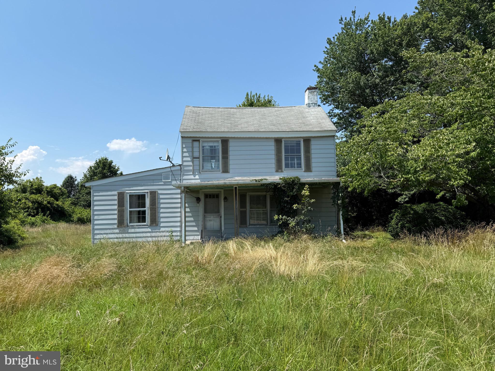 Approximately 2 acres zoned Village Center. Currently improved by older 2 story dilapidated house in need of tear down. Do not enter. Property has 580' of road frontage on both Rt. 213 and Clabber Hill Road. Great visibility and traffic count. Located in up and coming crossroad between Centreville and Chestertown. Village Center Zoning allows for residential and some light commercial uses. This property falls within the Maryland Opportunity Zone, find more information at Maryland.gov. Contact the county regarding septic information.