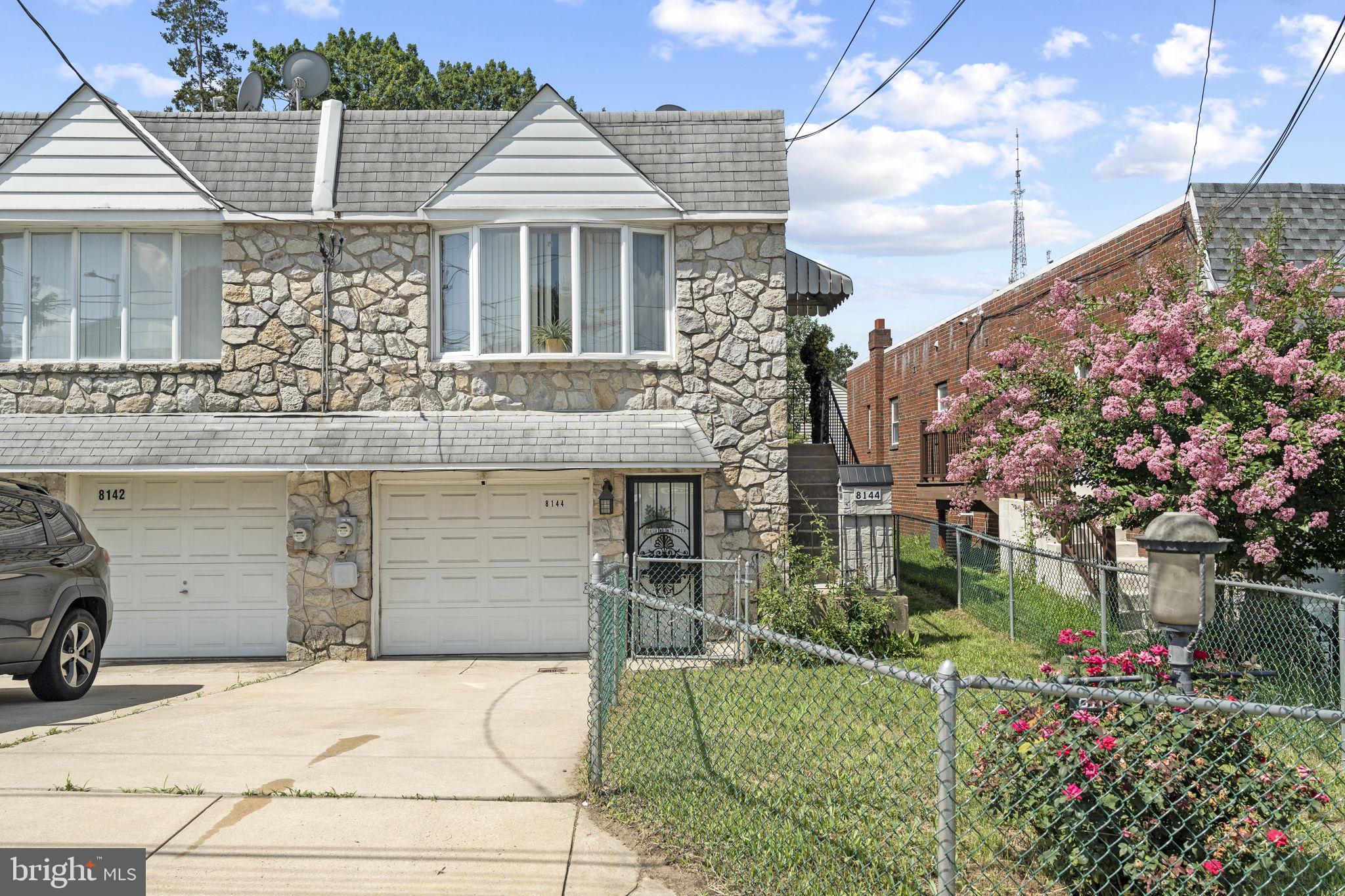 Amazing opportunity to purchase a 3 Bed / 2Bath twin home with over 1500 SQ FT and attached garage in Philadelphia’s Roxborough section. Made of brick and stone this home is located in Roxborough section of Philadelphia which is a nice blend of new families and long time residents.. Enter through the attached garage, or the side entrance. The side entrance opens into the living room on main level with a semi open floor plan into the kitchen. The main level consists of 3 bedrooms with hardwood floors underneath any carpeted areas, living, dining, kitchen area, and a full bath. The lower level offers extra living space perfect for a growing family. The lower level contains another full bath, multi purpose room with built in office/ sewing room, laundry area and a large family room with fireplace (non working). The family room leads to a fenced in back yard with storage shed. This house conveniently located close to shopping, parks, transportation, Main Street Manayunk , and quick access to Center City . HOME BEING SOLD IN " AS IS CONDITION"