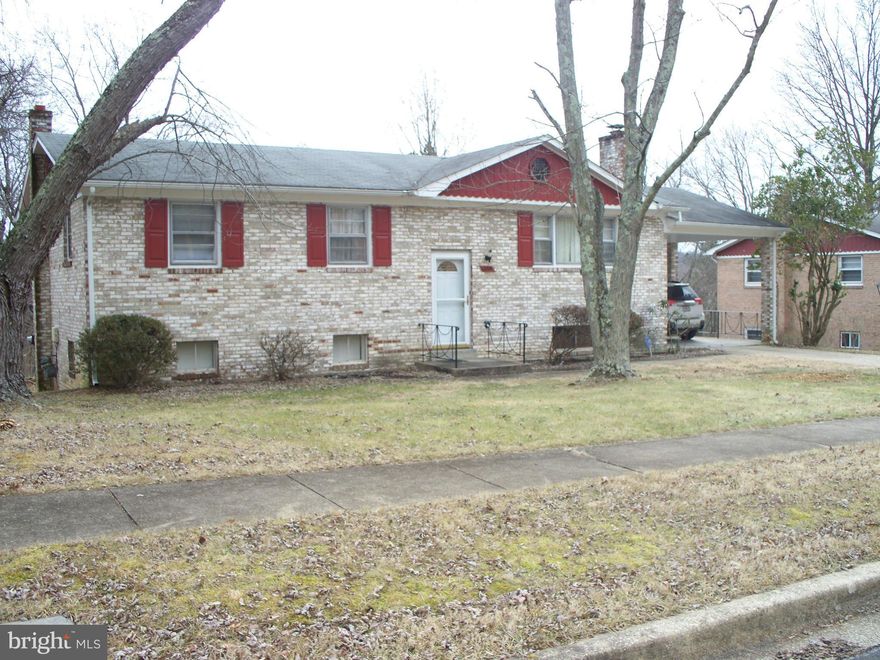 Main level recently painted and has 3 bedrooms, hall bath, updated master bathroom and almost new kitchen appliances.  Lower level has a fully finished basement with 4th bedroom, 3rd full bath, built-in bar, masonry fireplace and a huge recreation room.  This great home is conveniently located to major workplaces, roadways, schools, shopping, etc.   Don't miss out on viewing this beauty!