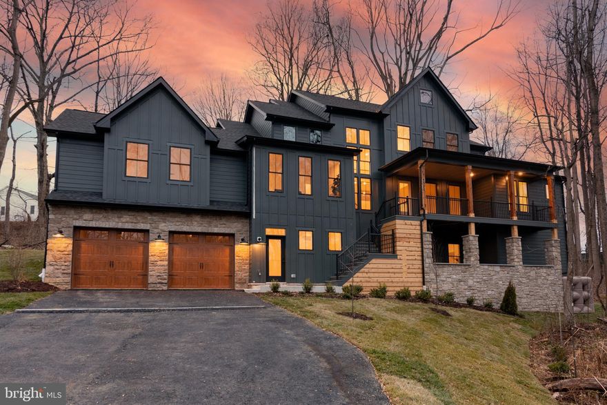 PUBLIC OPEN HOUSE SATURDAY 12/20 FROM 12-2PM AND SUNDAY 12/21 from 11AM-2PM. ***BRAND NEW*** and ready for immediately occupancy, this stunning property is set on a premium 2.3 acre cul-de-sac lot and clad with high end finishes throughout. This custom one-of-one estate home by Laine Street Homes offers a unique take on a modern farmhouse and features 5 bedrooms, 4.5 bathrooms and well over 5,000 finished square feet. The main level features soaring 2 story ceilings, 3 fireplaces, stunning light fixtures and champagne oak hardwood floors throughout. Main level amenities include a formal dining room, living room w/large picture windows and gas fireplace, a quaint inglenook/office, and a 24x20 great room. The gourmet kitchen is a showstopper with high end timber and graphite black cabinetry,  alabaster gold quartz countertops and slab backsplash,  a 48" artisan wood range hood, z-line appliances including a 48" dual fuel 6 burner range, large center island w/breakfast bar and an open apron farmhouse sink. Rounding out the main level is a primary suite featuring a walk-in closet with organizer system, secondary washer/dryer hookups and a spa-like bath with soaking tub, quartz countertops and walk-in shower with floor-to-ceiling calacatta marble attache tile. The upper level includes 3 additional bedrooms and 2 full baths. Enter the finished lower level where you will enjoy a spacious mudroom with custom built-ins, aa large laundry room (1 of 2),  recreational room w/direct access to a spacious porch, a full well appointed full bath and a multi-purpose bonus room - perfect for a bedroom, fitness room, playroom or office. Additional upgrades include premium Hardie plank siding, Pella Lifestyle dual pane energy efficient windows, 30 year architectural singles, dual zone 92% efficient HVAC system, 2x6 construction, air seal package, hardwood flooring throughout main and upper level, LVP in basement, quartz counters in all bathrooms, air seal package, sagiper porch trim and so much more. Enjoy this luxurious property in a premium location approximately 10 miles from Annapolis and 25 miles to Washington DC. This property will not last long, schedule your private tour today!