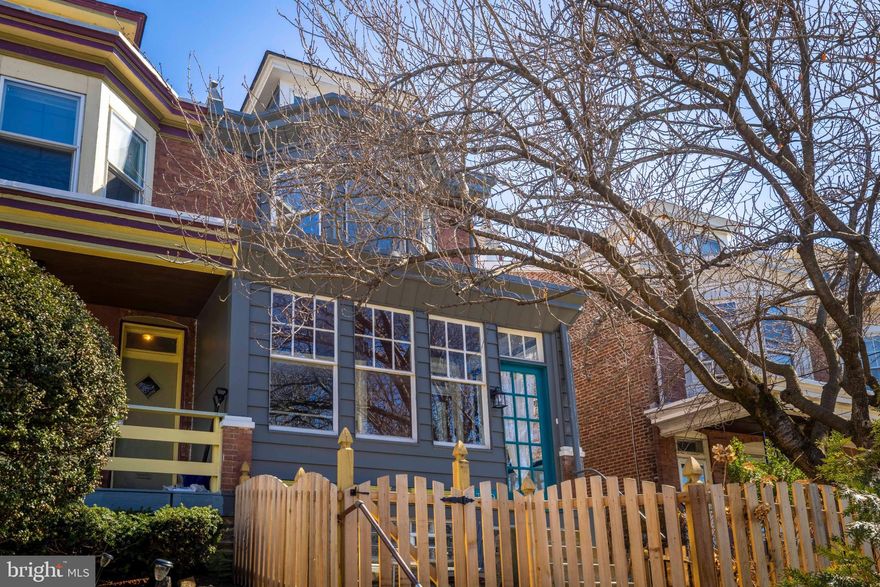 This character-filled 4-bedroom, 1.5-bath twin in Manayunk is proof that some homes simply age better than others. Brimming with original architectural details—tall baseboards, beautifully preserved unpainted woodwork, antique light fixtures, and even a charming double staircase—this home offers the kind of craftsmanship that’s hard to find today.

Natural light pours in from the east, south, and west, illuminating spacious rooms with original hardwood floors throughout. The welcoming enclosed front porch leads into a generous living room, followed by a dining area with a convenient pantry and powder room nearby. The fully renovated, sunny eat-in kitchen opens directly to the backyard—perfect for keeping an eye on the grill, the garden, or both. The kitchen has 2 sinks and an island (both great for parties) and was renovated with top of the line appliances. 

The classic front and back staircases lead upstairs to three comfortable bedrooms and a beautifully renovated bathroom with a walk-in shower. One more flight up reveals a bright fourth bedroom with gleaming hardwood floors—ideal as a guest room, office, gym or creative retreat.

Gardeners and dog owners will love the backyard. The fully fenced-in backyard features a deck, a slate patio for outdoor dining tucked within the garden, and a peaceful pond that adds a touch of tranquility. A side walkway paved with large slate stones provides easy access to the backyard—perfect for bicycles, gardening supplies, or the occasional ambitious plant purchases.

Located just a short walk from Main Street Manayunk’s shops, restaurants, and parks, the home also offers quick access to Center City via Route 76, City Line Avenue, and nearby public transportation.