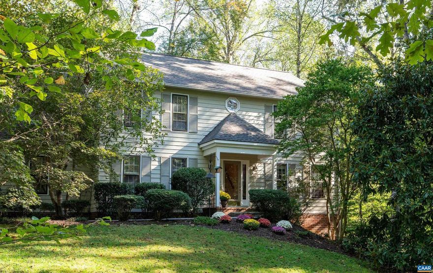 Spread out in this flowing Colonial home with incredible interior space: 5+ bedrooms & 4 full bathrooms over 3 levels. Set on a beautiful private lot, well off a quiet neighborhood road, this residence enjoys access to dedicated hiking trails, but is also just a short drive to 29 North shopping, UVA, schools & everything you need day to day. Enter to the formal living room & dining room, a spacious island kitchen, a sunny family room with french doors leading out to the deck. Top that with the convenience of a main floor guest bedroom with full bath (also perfect for an office). The main floor of this home has solid oak floors. The upper level features a spa-like primary suite with large dressing room, 3 more bedrooms, laundry & another full bathroom. The terrace level has 2 family room areas, an additional bedroom/flex space and full bath. The home is well maintained with recently installed HVAC, newer roof, an on-grade 2 car garage & generous driveway parking. Outdoor lovers: a neighborhood walking trail leads in two directions through a sun-dappled forest and right along the reservoir (see virtual tour) and don't miss the sunny field at the left rear of the lot. See Floor Plans, Features list in Docs. OPEN HOUSE - FEB 28 12-3.,Granite Counter,Fireplace in Family Room