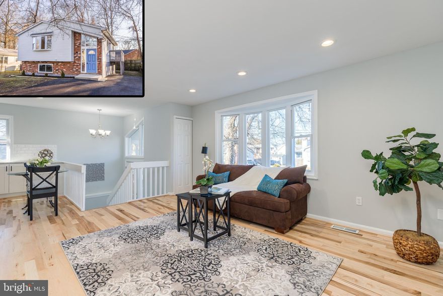 BEAUTIFULLY RENOVATED HOME! Enter into a bright and airy living area with brand new hardwood flooring that seamlessly leads into a completely redesigned grommet kitchen with stainless steel appliances and granite countertops.  Upstairs are 3 spacious bedrooms and a renovated full bathroom with custom ceramic tile.  The lower level with walkout features an additional large living area with an electric fireplace, laundry room, another full bathroom, fourth bedroom, and an unfinished area which is great for storage. Entertaining is a breeze with a huge wrap-around deck overlooking your private back yard.  There are tons of updates throughout and the entire house has been freshly painted making this home ready to move right into! House is vacant and easy to show so schedule your showing today.