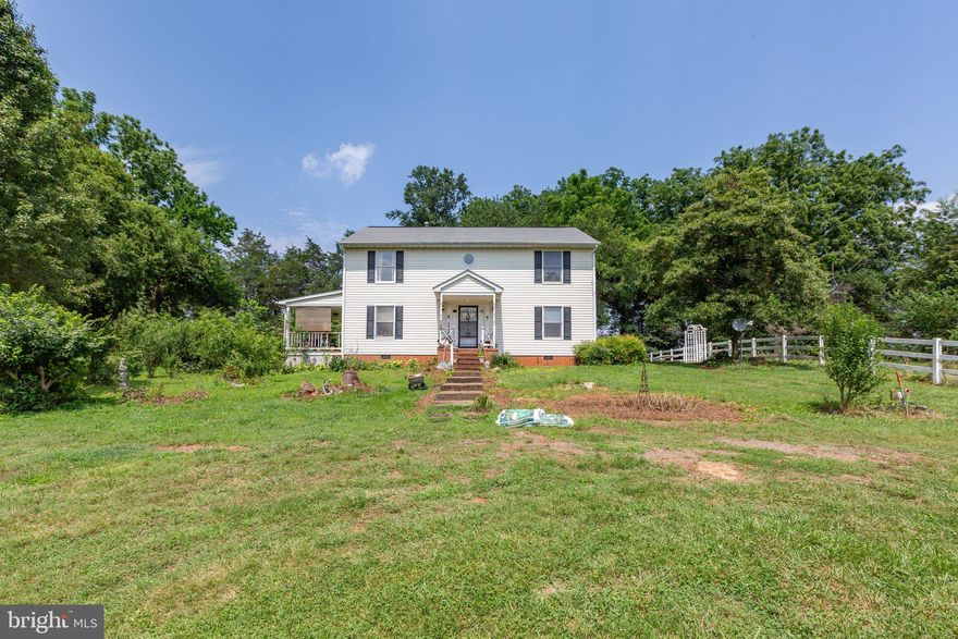 Country living near the Town of Orange.  This Colonial style home is tucked away on 5.02 acres.  Home boasts 2,290 square feet with 3 bedrooms and 2.5 bathrooms.  The main level features a living room, dining room, spacious kitchen, breakfast nook, and half bathroom.  The upper level features a primary bedroom with 2 walk-in closets, primary bathroom, 2 additional bedrooms and full bathroom.  Exterior features a spacious covered porch. Property has 4 fenced pastures with 3-Rail White PVC Fences, Barn, 2 Weather/Shelter Run-ins, Tack Room/Stall Combo, and Hay Feeding Rack with Canopy for your horses.  Property also features a Chicken Coop, underground dog fence, and Open 3 Bay Carport. The 5.02 acres consists of 2 lots.  The home is situated on a 2.1 acres lot with 2 fenced pastures.  The second lot is 2.92 acres with 2 fenced pastures. The home is conveniently located about .5 miles from the Town of Orange.  A Must See!
