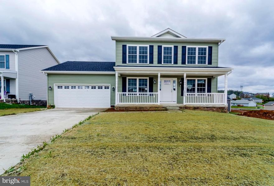 THIS NEW CONSTRUCTION HOME IN UPSCALE DEVELOPMENT IS COMPLETE AND READY FOR OCCUPANCY.  FEATURING: THREE BEDROOMS AND 2.5 BATHS / EAT IN KITCHEN WITH GRANITE COUNTERS AND STAINLESS STEEL APPLIANCES / FORMAL LIVING AND DINING ROOMS / LARGE MASTER SUITE WITH WALK IN CLOSET / TWO MORE SPACIOUS BEDROOMS / FULL WALKOUT BASEMENT WITH ROUGHED IN PLUMBING FOR FUTURE BATH / WATERPROOF LAMINATE FLOORING / FINISHED TWO CAR GARAGE WITH INSULATED GARAGE DOOR AND AUTOMATIC GARAGE DOOR OPENER / FULL FRONT PORCH. MAKE YOUR APPOINTMENT TO SEE THIS HOME NOW BEFORE IT IS GONE.