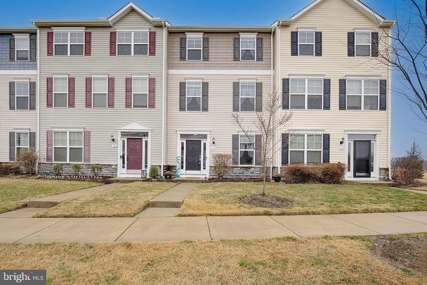 This charming Colonial townhouse in the desirable Ellendale community offers a perfect blend of modern comfort and inviting warmth. Recently renovated in 2023, the home features a spacious layout with 3 bedrooms and 2.5 bathrooms, including a primary suite with a large walk-in closet and an on trend bathroom with a stall shower. The eat-in kitchen seamlessly connects to the dining area, making it ideal for gatherings. Enjoy cozy evenings by the fireplace in the living room, or step outside to explore the community amenities, including a refreshing outdoor pool, clubhouse, and scenic jogging paths. Located just minutes from local parks and top-rated schools, this home is perfect for those who value community and convenience. With an attached garage and easy access to major transportation routes, commuting is a breeze. Experience the best of suburban living in a vibrant neighborhood that feels like home.