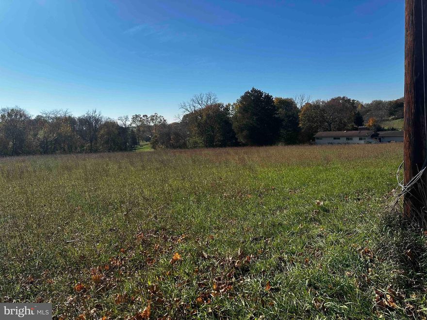 Nestled in the picturesque Falling Waters, WV, awaits a canvas for your vision. This 5.42-acre parcel off Grade Road is unrestricted, offering you the freedom to turn your dream into reality. Whether you're yearning for a tranquil escape, a weekend retreat, or a grand estate, there are no limitations here. What's more, the convenience of hooking up to county septic simplifies the building process, making it an even more enticing opportunity. One of the standout features of this lot is the beautiful pond in the back, providing not only a serene setting but also the possibility for various outdoor activities and water views. With its prime location, expansive acreage, and the unique bonus of a private pond, this property is your blank canvas for the perfect lifestyle. Don't miss your chance to seize this remarkable opportunity!