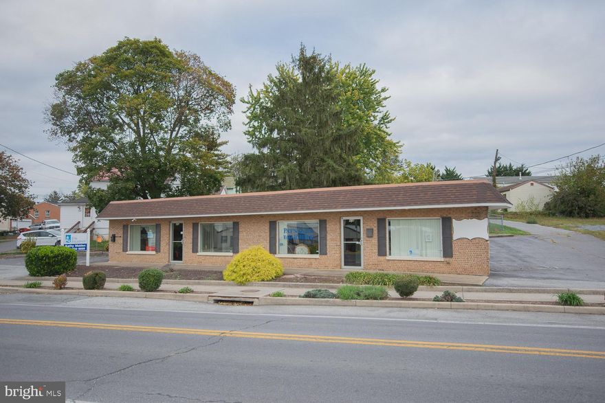 Great 2 Unit investment property convenient to everything in a high traffic area. Currently it is the home of Erie Insurance company. Use one side and rent out the other.  Half bath with each unit. Just under 2000 square feet with numerous office spaces/ rooms on each side. Call for an appointment today.