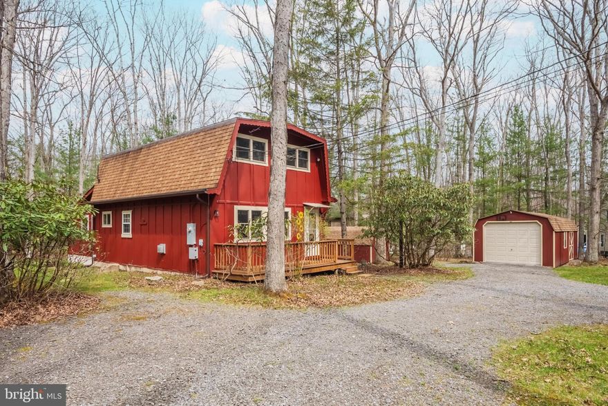 5BR 1.5BA classic Deep Creek cottage on Harvey's Peninsula with a dedicated dock slip!  Lovingly maintained and well-cared for 'Dutch barn' style home offers an open floor plan, plenty of nostalgia and a mix of modern conveniences. Features include an eat-in kitchen, propane fireplace, oak hardwood floors & LVT, bedroom & bathroom addition, window and roof replacement and ductless mini-split heat/AC. Outside, a detached garage, multiple storage sheds, outdoor fire pit and pavilion. Large circular driveway with plenty of parking, sun-drenched lot surrounded by mature trees. Private community feel. Sold furnished minus sellers personal items and memorabilia. Dock slip through nearby Harbor association.