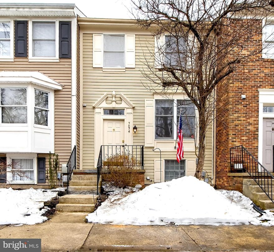 Boasting over $25K in recent updates, this beautifully refreshed 3-bedroom, 2.5-bath townhome backs to a serene wooded setting and is ideally nestled in the sought-after Chesnut Hill Cove community, just moments from Stoney Creek Marina. Enter to fresh paint and LVP flooring throughout the inviting, light-filled main level. The spacious kitchen offers ample cabinetry, an updated stainless steel electric range and refrigerator (2023), a breakfast bar, and a large window that fills the space with natural light. A pass-through overlooks the living and dining areas, where the open layout creates the perfect setting for relaxing or entertaining friends and family, complete with a conveniently located powder room. Retreat upstairs to find continued updated flooring leading to the owner’s suite featuring a built-in vanity counter, walk-in closet, and access to the shared full bath with a dual-sink vanity, updated tiled flooring, and new Bath Fitter tub/shower (2023). Down the hall are two additional generously sized bedrooms, each offering ample closet space. The walkout lower level has been refreshed with beautiful flooring installed in 2025 and offers a versatile space featuring a spacious rec room, additional closet storage, a full bathroom with a stand-up shower, and direct access to the rear yard, ideal for movie nights, guest quarters, or a private in-home office. A utility room with washer and dryer provides additional storage space for all your organization needs. Step outside to enjoy serene wooded views in the rear deck with a fully fenced yard, a wonderful setting to create your own private outdoor retreat. Recent updates include HVAC (2019), roof (2018), LVP flooring throughout (2022–2025), a new basement toilet (2025), and a leaf filter gutter system for added peace of mind (2024). Plenty of parking is available directly in front of the home, along with additional spaces for guests and extra vehicles throughout the community. Fantastic amenities include playgrounds, basketball courts, a boat ramp, boat slips, a fishing pier, and nearby boat and RV storage. Don’t miss this incredible home surrounded by scenic creeks, marine life, and local shops and restaurants for everyone to enjoy.