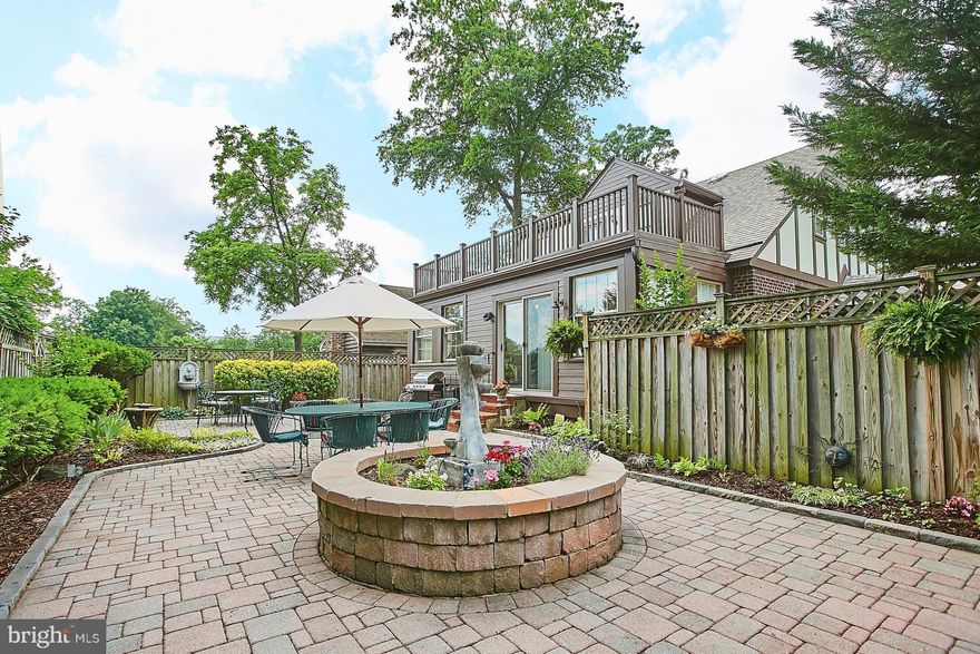 Priced to Sell & in move-in condition! Beautifully updated & spacious - perfect for everyday living and entertaining. Plus,WALK to Metro, restaurants and shopping location. Over 2800 finished sq ft. Custom kitchen for the gourmet cook. Large, fenced patio w/ fountains. Hardwood floors. Main level family room. Sep Dining Room. FP in LR. Landscaped yard w/irrigation. It's all been done!