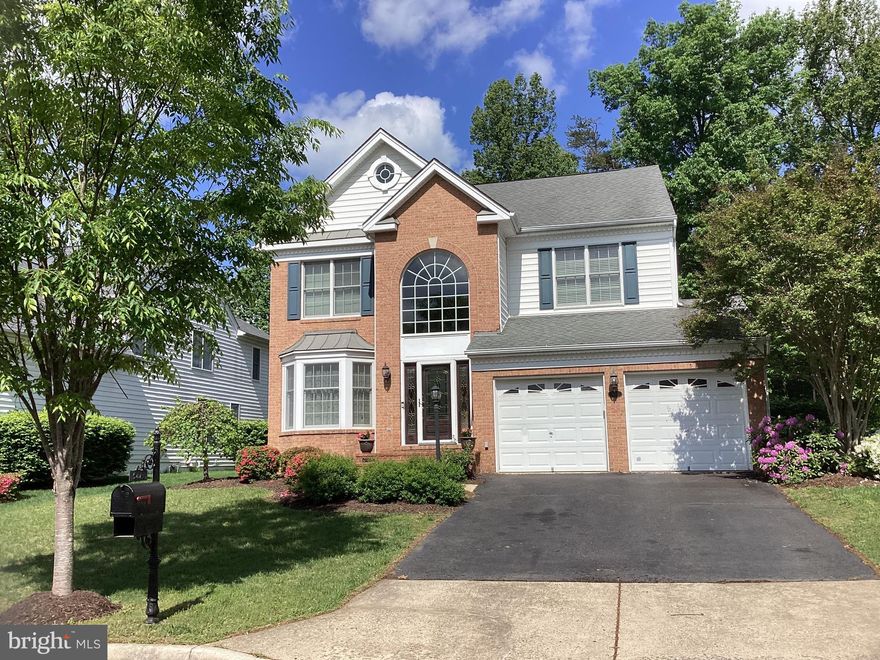 ***Gorgeous Home in gated country club community***located within a cul de sac and walking distance to pool and parks***Access to multiple pools, sports pavilion, tennis courts, parks, bike trails and clubhouse.  Convenient to restaurants and shopping.
Elementary, Middle and High school within community! ***Excellent school district***
Features 3 finished levels, 4 bedrooms and 3 1/2 baths.
Basement features a full bath, media room and Rec room with rear walk-up.
***Tons of detail***Crown molding, updated paint, hardwood floors and updated gourmet kitchen***
***Outside offers screened in porch, with custom patio and tree lined fenced yard****