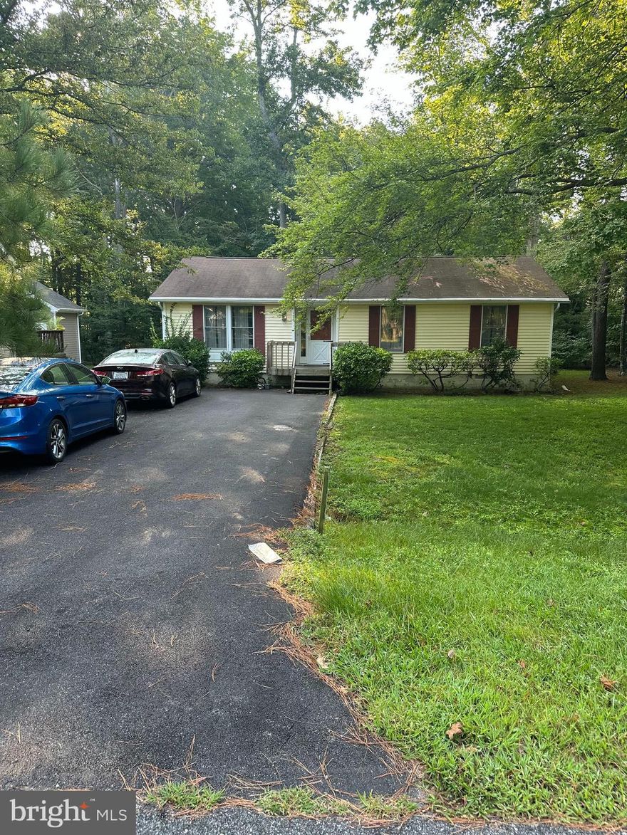 Welcome to your next home in the serene community of Ocean Pines. This charming 3-bedroom, 2-bath ranch-style house offers a unique blend of comfort, potential, and affordability that's hard to find in today's real estate market.

Inside, you'll find three spacious bedrooms, providing ample space for your family or guests. Two full bathrooms ensure convenience, with an en-suite for the primary bedroom.

The single-story layout of this home makes it incredibly accessible, whether you're starting a family, downsizing, or seeking a retirement retreat.

Step outside, and you'll be greeted by a wooded lot, a haven for nature enthusiasts. Imagine enjoying your morning coffee surrounded by the serenity of nature, or hosting outdoor gatherings with friends and family.

While this home needs a little Tender Loving Care (TLC), it offers you the opportunity to bring your creative vision to life. With some investment and personal touches, you can transform this property into your dream home.

Ocean Pines is known for its community amenities, including parks, golf courses, swimming pools, and easy access to nearby beaches. This home is priced to sell, presenting an exciting opportunity to become a part of this thriving community!
THIS WILL TRUELY NOT LAST!!!