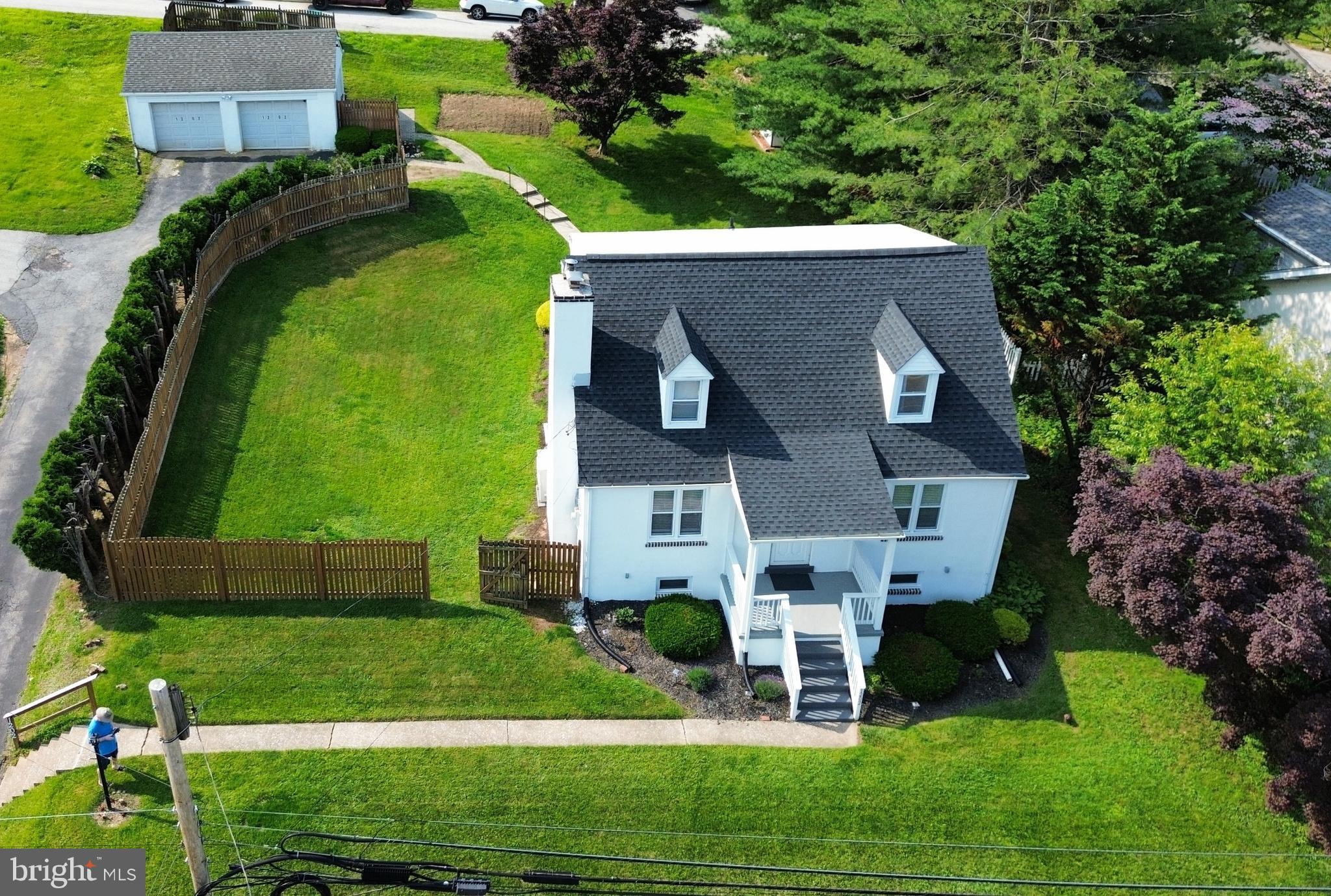 Welcome to this delightful home nestled in the vibrant community of West Conshohocken in Upper Merion Township. This charming residence offers a comfortable living space on an impressively large lot, creating a peaceful oasis for you to enjoy. Please note that the plot plan on public records is not accurate; the lot extends 15 feet to the left of the garage and the property lines are staked.
Inside, you'll be greeted by the warmth of refinished hardwood floors that seamlessly flow through the living room, dining room, and bedroom. The cozy living area is perfect for relaxation, complete with a welcoming fireplace for those chilly evenings. With three spacious bedrooms and 1.5 baths, this home ensures ample space for everyone. Each room is equipped with mini splits, providing efficient heating and cooling year-round. The kitchen is freshly painted and features luxury vinyl flooring, a ceiling fan, stainless steel appliances, and updated countertops and backsplash.
For those who enjoy the outdoors, the three-season sunroom offers the perfect spot to unwind and soak in the natural surroundings. The full basement provides additional space for storage or hobbies, accommodating your various needs.
Outside, you'll find a two-car detached garage with electric and garage door openers for your convenience. Additionally, a shed offers extra storage for your outdoor essentials. The roof, completed in 2024, and a freshly painted exterior in 2025 ensure peace of mind for years to come. There is also a possibility that the backyard could be expanded for additional parking and a back driveway could be added to the garage.
Conveniently located near many desirable restaurants, the King of Prussia Mall, public transportation, major highways, and the serene Valley Forge Park, this home offers easy access to all the amenities West Conshohocken has to offer. With low taxes and situated in the Upper Merion school district, this home is a rare gem waiting to be claimed. Don't miss the chance to make this perfect residence your own!