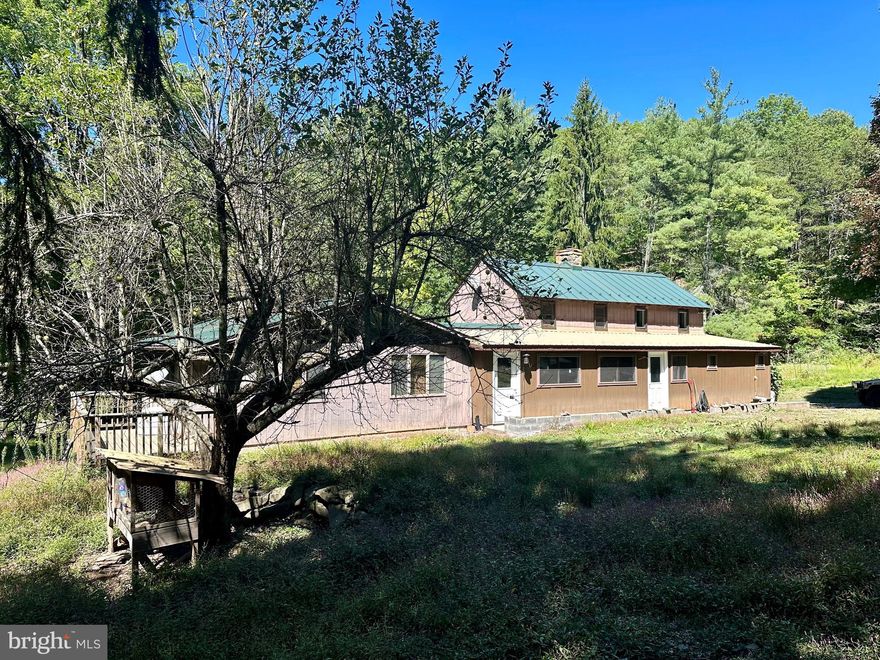 Business Opportunity for hunting lodge or glamping business! This beautiful property has everything for the owner to start a camping/glamping business with two teepees already set up and lots and materials for four more, offer as a hunting lodge or the perfect residence.  The four parcels of property offer two ponds, two hayfields, creeks, garden area, a grapevine, chestnut tree, and numerous outbuildings.  Property is offered fully furnished (except for two chairs), including window treatments, woodstoves, with outside tools and workshop contents.