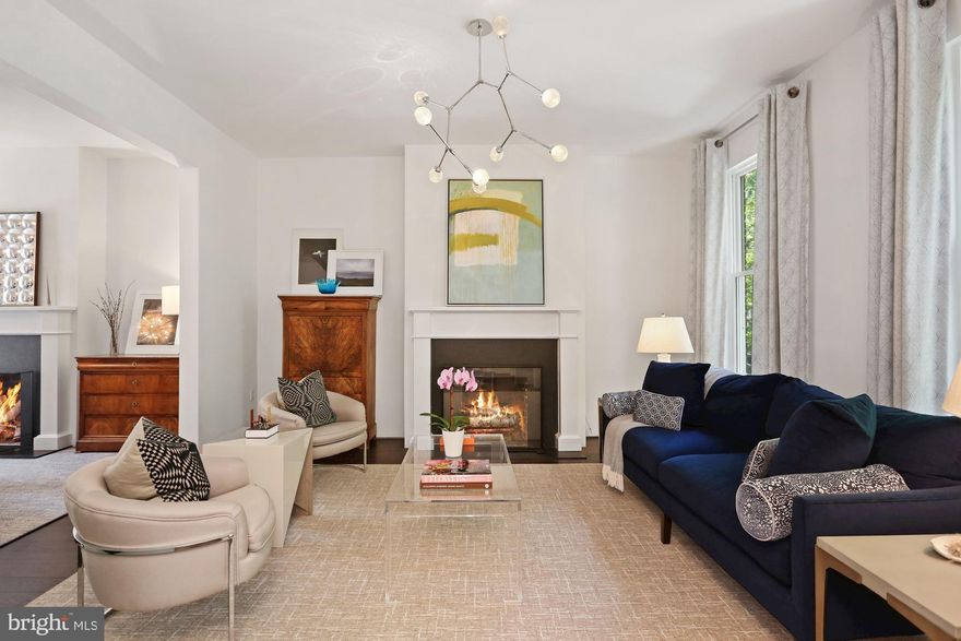 Traditional elegance and a unique, contemporary vibe come together perfectly in this one-of-a-kind Logan Circle Federal with three bedrooms, three bathrooms, a lovely, private garden, and garage.   
 
1442’s foyer welcomes you into a sophisticated living room that flows easily into the formal dining room.  The spacious kitchen and family room feature an exposed brick backsplash on one side and a wall-of-windows on the other. French doors lead from the kitchen to a private garden oasis, complete with stylish landscaping, room for outdoor seating and entertaining, and a detached garage.  

The upper level has two bedrooms and baths.  The large primary suite boasts three windows overlooking a canopy of trees, and the renovated bathroom off the primary provides a spa-like atmosphere with an enormous shower and architecturally-designed, soaking tub.  The generously sized, walk-in closet houses a second laundry for the home.    

The terrace level, with a separate entrance, is the perfect guest suite with a dedicated recreation room, bedroom, and bath.  A bonus room houses the primary laundry, plentiful storage, and mechanicals for the home.

The 1400 block of Q Street NW has some of Logan Circle’s most desired residences, this being one of them.  

*Please Note the Photos of the Residence's Fireplaces Do Not Represent Their Functionality*