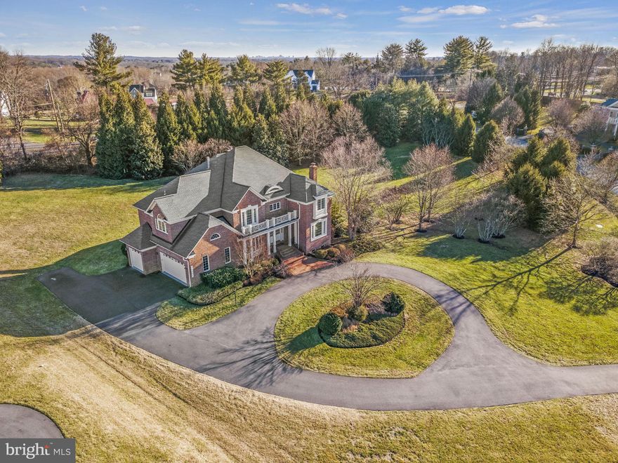 This stunning home is nestled on 2 acres of beautifully manicured land on the exclusive cul-de-sac of Masonwood and provides unparalleled privacy and tranquility. The grand circular driveway and elegant two-story entrance foyer sets the stage for the spacious and magnificent living areas throughout the home. The gourmet eat-in kitchen is a chef's delight, featuring a spacious island perfect for gathering around and opens to the large family room with walls of windows, a designer coffered ceiling, and one of the five fireplaces in the home. The home office is tucked away on the main level offering privacy and plenty of natural light ideal for those who work from home. The main level is complete with an elegant dining room, a large living room, two powder rooms, a walk in pantry and a large mud room leading to the oversized 3 car garage. Upstairs, the primary suite wing is a true oasis, complete with a sitting room, a double sided fireplace, two walk-in closets and a spa-like bathroom with a soaking tub and separate shower. Three additional bedrooms, each with en suite bathrooms, round out the upper level and provide plenty of space for family and guests. The fully finished walk out basement features two additional bedrooms, a full bathroom, an additional powder room and a large recreation room with a full wet bar. This home is truly a dream come true for those who value luxury, privacy, and comfort. With its spacious living areas, luxurious design, and beautiful 2 acre corner lot, it is the perfect place to call home (new roof 2020, new HVAC 2018, new circular driveway 2022, new flooring 2023).