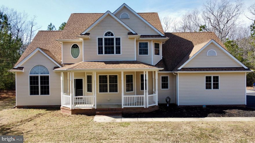 Welcome to this stunning Colonial home situated in Great Mills, MD, within the highly sought-after Leonardtown High School District. Spanning over 3,400 sq ft, this residence features a spacious open floor plan that includes three bedrooms, a large bonus room, and two full baths plus a convenient half bath. Step outside to enjoy the expansive covered front porch, and relax in the inground swimming pool surrounded by a six-foot vinyl privacy fence. The property covers a generous 2 acres and offers additional amenities, including a country kitchen with a sizable pantry, an oversized side-load two-car garage, and a recently sealed driveway. The home is equipped with dual heat pumps and a propane backup system for the lower level, ensuring your comfort year-round. With a 250-gallon propane tank included and a backup generator with power cord and junction box, this property provides peace of mind. Plus, enjoy access to the picturesque St. Mary’s River via the nearby pier. Don’t miss this opportunity to own this exceptional property!
