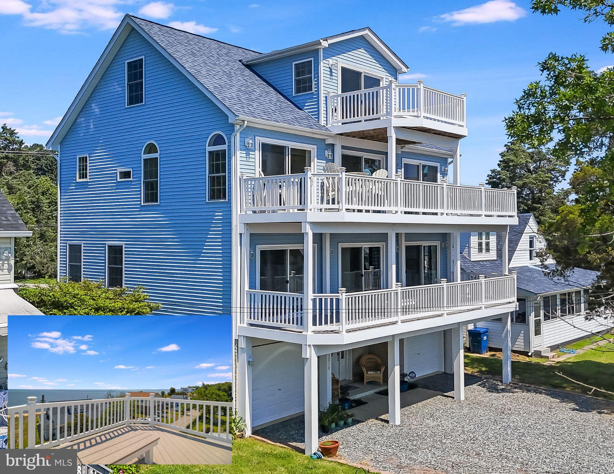 Looking for a Beach without the Bay Bridge traffic? You are in for a great surprise here in Huntingtown! Gorgeous community beach on the Chesapeake Bay! This home offers gorgeous views of the Bay from all 4 levels! Iconic Neeld Estates offers a community that transcends time. Homes get passed down from generation to generation. This home was built on a lot just 12 years ago, whereas most homes in the neighborhood are significantly older. A great second home, or a 4000+ square foot primary residence! Here you will have 4 bedrooms, 3 with private en suite baths and full bath on upper level w/ 4th bedroom. In Neeld Estates everything revolves around the water. Decking off the primary suite and the bedrooms as well as decking off the kitchen and family room and even a large deck of the 4th story bedroom/living space calls you to the waters of the Chesapeake Bay. There is a community beach with 3 separate entrances just across the street from this home. The subdivision also has community house that can be rented out for parties. Just painted inside, the home looks like it is brand new again! The lower level features the perfect area for beach goers. There is a side door with area to rinse your feet off from the sand, half bath, and a wet bar area to get drinks for the beach. All without making a mess in the house!
Two car garage gives you lots of parking space and the driveway will accommodate 3 additional cars easily. One of the most beautiful beaches in Calvert County. You have to see it to experience what this special place is all about. Don't worry about the 4 levels, the owner had the house built with an elevator shaft already in place should you want to put one in at a later date!