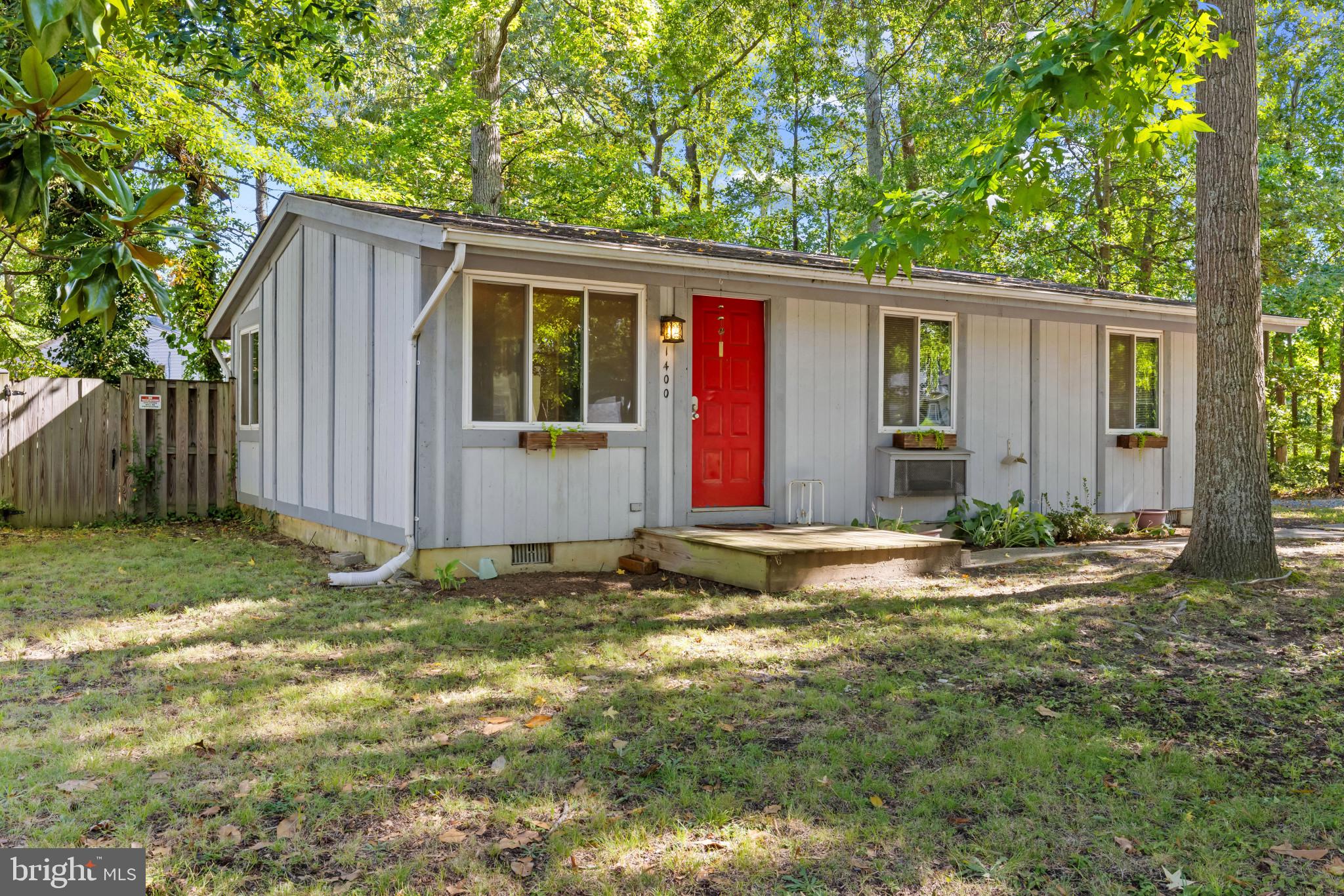 Quaint cottage in the water access neighborhood of Oyster Harbor is ready for you! Water access is a block away from this corner fenced-in yard. New deck, newer well pump, roof replaced in 2020. The home has updated appliances, a water filtration unit(owned), an updated bathroom, a newer washer and dryer set (2024), and hardwood floors. Move in and make it your own. Beach access, launch ramps, pier, and tot lots all surround this water-oriented community. Freshly painted and move-in ready! Come check this one out.