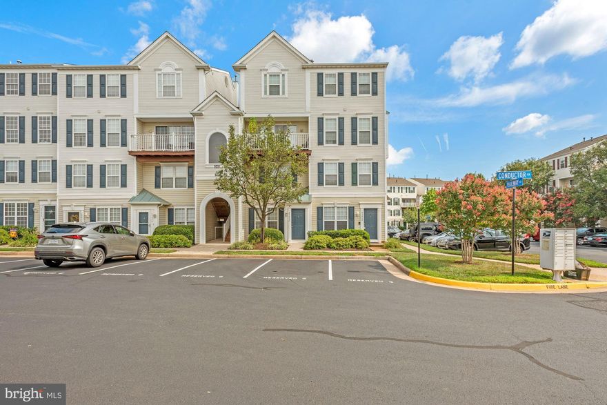 Location! Location! Be anywhere in just moments in this move-in ready town house style condo. This ground floor entry end-unit boasts a spacious kitchen with granite countertops, new stainless steel appliances, gas cooking, large pantry and dine-in area. The living room has a stunning gas fireplace with mantle and marble surround with sliding glass doors leading to a covered patio with storage closet. Hardwood floors throughout the living and dining rooms plus a half bath lead towards the stairs to the 2nd level. New paint in the foyer leads upstairs to the double primary suites. The first suite is newly painted and spacious with built-ins, plus a walk-in closet. Sliding glass door opens to private balcony, the perfect place to enjoy a morning coffee. The en-suite bath is updated to include custom paint, tile flooring, dual vanity plus separate soaking tub and stand up shower. The second suite boasts walk-in closet and en-suite combo tub and shower. Enjoy all the amenities of Dominion Station with pool, biking paths, tot-lot, and more just around the corner.