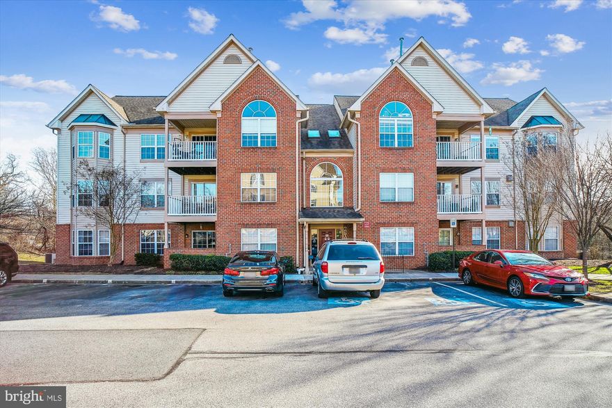 Excellent one-level living in wonderful amenity-rich Spring Ridge!  No stairs from the secure entry to your sun-filled home! Sit back and enjoy the convenience of this updated, move-in-ready charmer.  Upon entry, you will see through to the balcony and trees and know why this end unit is special.  The floor plan is flexible and the kitchen is the star of the show boasting new appliances, gas cooking, and a new backsplash.  The primary bedroom is an oasis.  Running the length of the home it boasts an expansive area fit for a California king, a huge walk-in closet, and a private ensuite bath. You can see for yourself that the 2nd bedroom is spacious with room for a queen (bed) and a wall of closets.  The owners have updated and added a ton of new features in the last three years,  There has been a lot of new flooring -including the popular luxury vinyl tile,  kitchen appliances, and a beautiful kitchen backsplash.  Both baths have been refreshed,  ceiling fans added for comfort, a new water heater,  and the home has been painted.  If you like a bit of outdoor fun you will love the Spring Ridge community boasting pools, playgrounds, trails, and more!  Call your agent and come see for yourself!