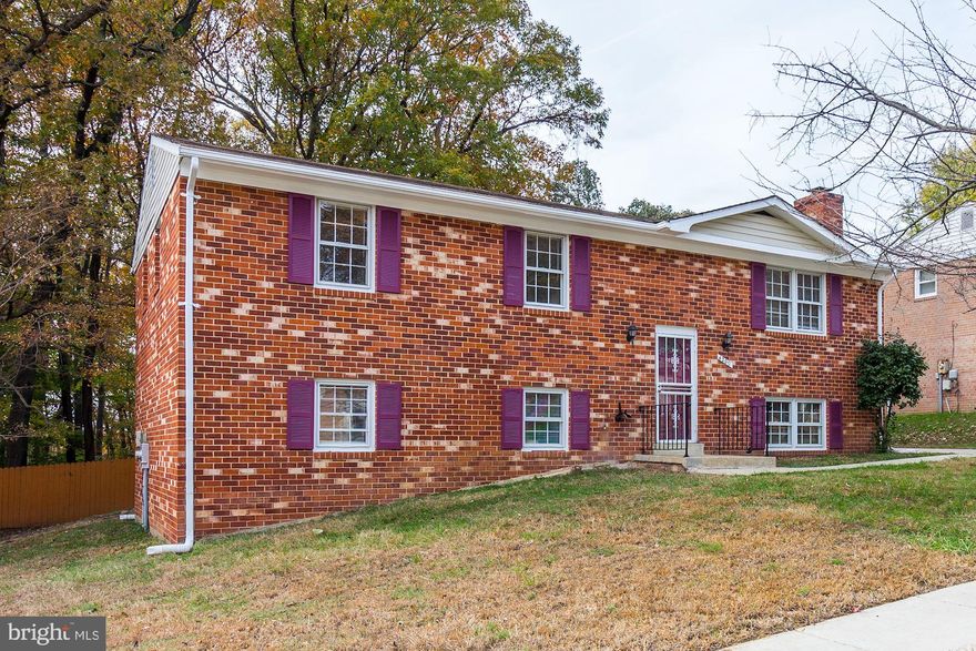 OFFER DEADLINE Friday 11/22 at 5PM. Fantastic single family home in Hillcrest Heights! Featuring 5 bedrooms and 3 baths, this property has plenty of recent and brand new updates. Newly refinished hardwood floors on main level, brand new carpeting on lower level, and modern lighting throughout. Beautifully upgraded kitchen with new stainless steel appliances, new granite counters & backsplash, large kitchen island. Recently updated baths with ceramic tile floors, updated vanities, and brand new ceramic tile on walls. Fully finished lower level with 2 bedrooms & full bath, plus spacious family room with fireplace. Large front and backyards perfect for enjoying the outdoors, and off street driveway parking is a must have. Hillcrest Heights is a quiet residential area just 2 miles from the DC border that consists mainly of single-family rambler homes and duplex homes built in the 1950s and 1960s. A stone s throw from the peaceful greenery of Hillcrest Park and the North Barnaby Recreation Area. 2 miles to The Shops at Iverson and Marlow Heights Shopping Center with a plethora of shopping and dining options, including Giant Food, Macy s, and Phoenix Theatres Marlow 6. The perfect commuter location by car or train, this home is convenient to the Naylor Road, Suitland and Southern Ave Metro stations on the Green Line, as well as Branch Ave, Suitland Parkway, and the rt 495 Capital Beltway. Welcome home! Ask abt: $500 KVS buyer credit.