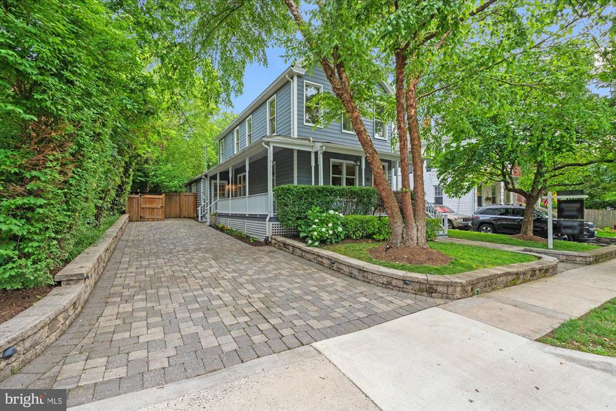 Beautiful detached farmhouse in the heart of Del Ray! Welcome to 411 E Bellefonte. From the moment you step onto the wrap-around front porch, you will feel at home. Boasting 4 beds and 2.5 baths and sited on an extremely large lot (over 10,600 square feet!), this home truly has it all. Enter into the formal living room - featuring high ceilings and wood floors, this space is perfect for evening cocktails or hosting family and friends. This room flows easily into the dining room - a great spot for everyday meals or dinner parties. The rear of the home features a large kitchen with an abundance of cabinetry and counter space - ideal for the gourmet chef or everyday cook. The island is a great space for catching up while making dinner or for breakfast on the go. The family room is the perfect spot for movie nights or casual get togethers. Just off the family room is a main level bedroom doubling as an office or playroom. A half bath rounds out this level. The yard is a dream - with an amazing, oversized screened porch and hot tub, this space is perfect for hosting summer parties or watching football on crisp fall afternoons. The flat yard boasts mature plantings, beautiful shrubs, a paver patio and gorgeous landscaping. Just when you thing you've seen the yard - there's more. Beyond the fence, the property continues - with two large sheds - great for a gym, office space or storage. Convert these into an ADU or rear garage - the opportunities are endless. Back inside, head upstairs to three bedrooms and two full bathrooms. The primary bedroom and bathroom are a fabulous owner's retreat! Two additional bedrooms and a shared bathroom round out this floor. You will love living in Del Ray! A tight-knit community with so much to do - walk to the Farmer's Market, festivals, shops, restaurants, fitness studios and so much more. Commuting? That's a breeze! Walk to Metro or jump on Route One, GW Parkway or I-395. Less than 10 minutes to Reagan National Airport, Old Town and more - welcome home!
