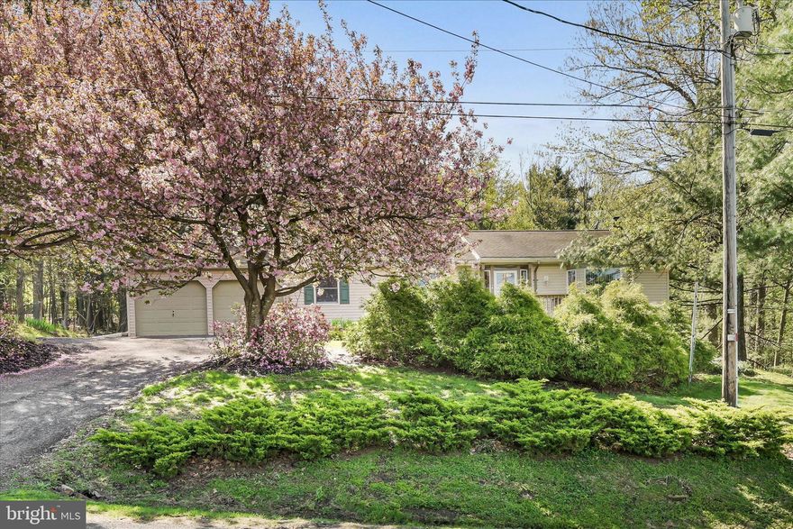 OPEN HOUSE 4-26-26 from 1pm-3pm.  Buyer's must be accompanied by their agent or their agent must contact listing agent and register their buyer's no later than 6pm Saturday 4-25-26.  If not registered, buyer's will not be able to enter this gated community.  Take advantage of this incredible opportunity to own a beautiful home within the Schuylkill Haven School District portion of Lake Wynonah boasting of a 1.61 acre useable corner lot!  Lots this size are few and far between so don't delay scheduling a tour!  Step inside to beautiful hardwood floors, generously sized rooms, and a lower level with over 2000 square feet of potential living area begging to be finished.  If you love to cook and entertain, you'll be delighted at the abundance of both counter and cabinet space in the kitchen.   The large dining area will provide ample seating for all of your guests.  Whether entertaining or simply relaxing, take advantage of the sound system installed and enjoy music in every room or just the room you're in.  While it is not currently blue tooth compatible, a simple change of speakers will bring this up to date!  From the dining area, you have access to the expansive wrap around composite deck where you'll enjoy a variety of blooming trees in the spring and fresh peaches right from the partially fenced in yard in the summer.  The large living room lends itself nicely to oversized furniture or that big screen TV all while being able to enjoy views of nature through the windows.  Despite being nestled amongst the trees there is an abundance of natural light throughout the home.  Wide doors and hallways, as well as a large entry closet and linen closets, lead you to the three bedrooms and main bathroom.  The primary bedroom suite provides an expansive layout which will place no limits on bedroom furniture selections.  Additionally, the primary ensuite does not disappoint with a welcoming soaking tub, walk in shower, and substantially sized double vanity.   A few additional perks include the radon system, ring system, generator (plugs in at rear of home), and 2 year young tankless, wall mounted, propane boiler with domestic hot water system.  Now that we've covered the inside let's talk about this great lot!  If you're looking for the space to build another garage, want a fire pit area, a picnic pavilion, a pool, or just a serene area to hang a hammock, you'll find that and more here!  Behind the shed you will be able to follow the pins to view the property boundaries in the rear.  When viewing the home from the street the property goes to near the mailbox to the far left where you see the water lines.  An adjoining lot in the rear that connects to Crow Foot Drive is also available for sale which would give you 1.91 acres if desired.   All appliances and the pool table remain with the home.  Additionally, the dining room and bedroom furniture (not the beds) are available to purchase if the buyer is interested.  Get your preapproval ready, place your offer, then pack your bags to move into your expansive Lake Wynonah retreat!  Any questions regarding the dam repair taking place over the next approximately 4 years should be directed to the community office.