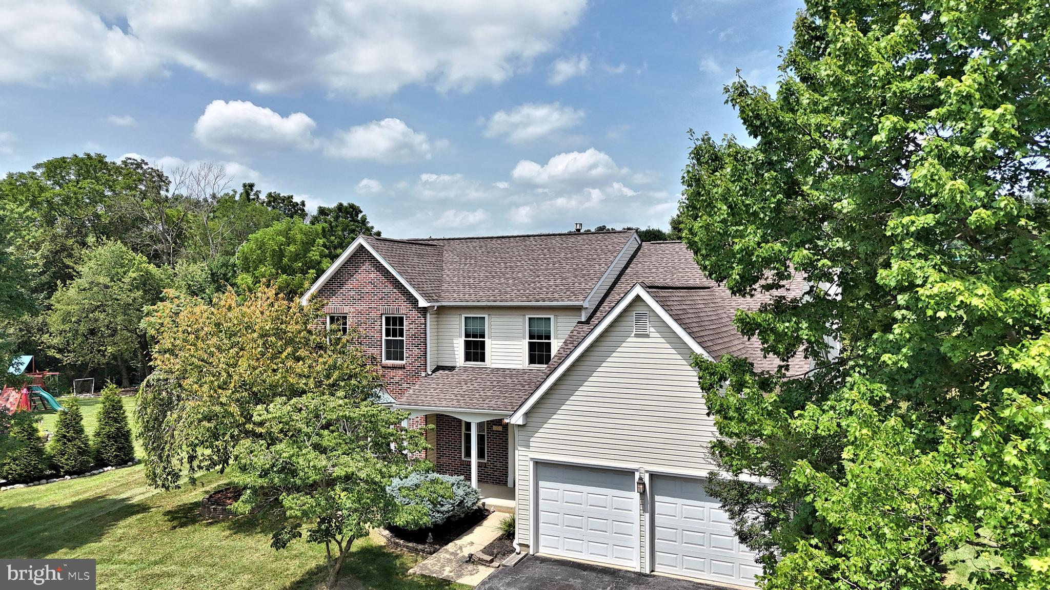 Welcome to your dream home in the sought-after Greentrees community, located within the award-winning Spring-Ford School District! This beautifully maintained and thoughtfully upgraded residence is ready to impress from the moment you arrive, starting with a charming covered front porch and freshly painted interior (2022).
Step inside to a warm porcelain-tiled foyer that seamlessly flows through the gourmet eat-in kitchen and sunny morning room. To your left, a spacious living room offers plenty of natural light and leads to the elegant dining room with serene views of the lush backyard and open space beyond.
The heart of the home is the stunning kitchen—featuring granite countertops, a stylish tile backsplash, farmhouse sink, and large pantry. The open layout connects to a cozy family room with plantation shutters and a gas fireplace—perfect for relaxing or entertaining.
Unique to this home is a beautiful sunroom bump-out with ceiling fan, providing extra space to gather and easy access to your backyard oasis, complete with picturesque views of the community’s green common area. A spacious laundry room and updated powder room complete this level.
Upstairs and on the staircase, you’ll find newer carpet (2024) and a luxurious primary suite with vaulted ceilings, a spacious walk-in closet with attic access, and a private sitting area. The spa-like en-suite bath includes a soaking tub and a sleek frameless shower installed in 2023. Two additional oversized bedrooms with ceiling fans—made even larger with a 2-foot bump-out—share a full hall bath with tile flooring.
Need even more space? The finished basement offers room for recreation, fitness, hobbies, and includes a generous storage/project area. A spacious two-car garage completes the package.
Additional updates include HVAC (2015) and water heater (2020). Don't miss your chance to own this move-in ready gem in one of the area’s most desirable neighborhoods!