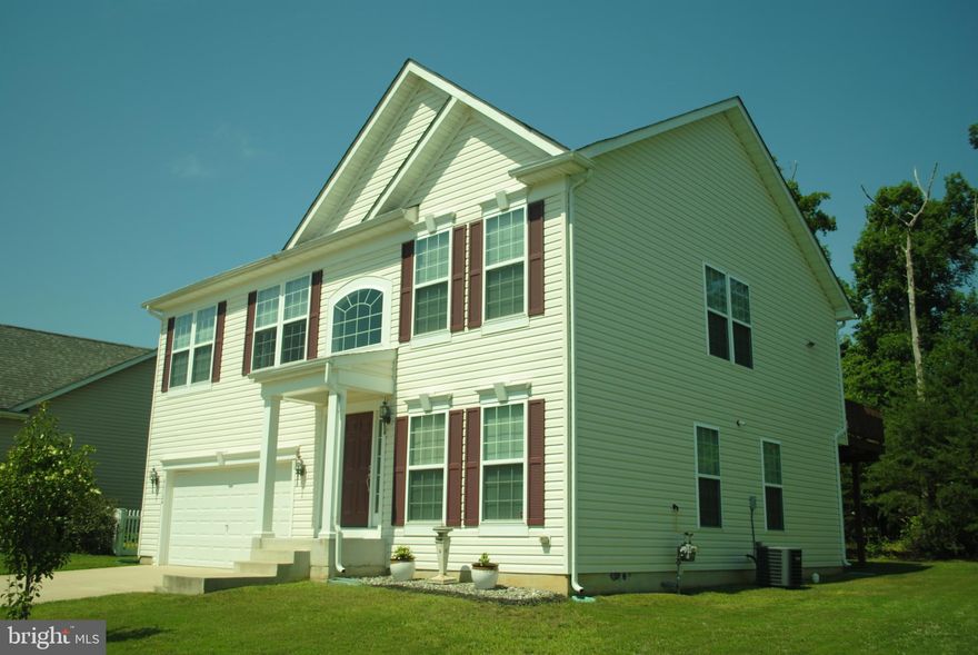 Beautiful haven just three minutes from Gate 1. Four spacious bedrooms, living room, and large family room.  Large deck for weekend cookouts and entertaining. Outdoor play area as well.  Overhead storage in garage. So close to so much.
