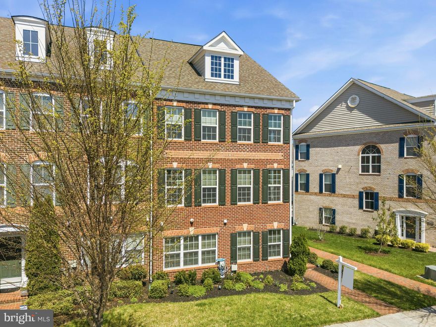 Experience luxurious living in this stunning three-bedroom, three-and-a-half bath end-unit brick townhome with a two-car garage, perfectly nestled in the prestigious, amenity-rich Beech Tree Village community. This home also offers a rare opportunity: an FHA assumable mortgage at an exceptionally low 3.75% interest rate—outstanding compared to today’s rates. This updated, sunlight-drenched residence spans over 3,000 square feet, offering ample space for relaxation and entertaining. Step into the welcoming main level, accessible from both the front entrance and the attached garage. Here, you’ll find a full bathroom and a generously sized family room—ideal for movie nights, gatherings, or a peaceful retreat after a long day.   Upstairs, you’ll be impressed by the completely open floor plan. The gourmet kitchen offers a large island that comfortably seats six, abundant cabinet storage, and stylish pendant lighting. Enjoy sleek stainless steel appliances, gleaming granite countertops, double wall ovens, and a gas cooktop with an elegant range hood, perfect for any chef. The kitchen flows seamlessly into the spacious dining area and inviting living room, where a built-in electric fireplace creates a cozy ambiance. Step outside to your private, maintenance-free composite deck—complete with a pergola and privacy wall— ideal for relaxing or entertaining guests.  On the upper level, retreat to the tranquil primary suite, featuring a decorative tray ceiling, a second built-in electric fireplace, a walk-in closet, and a spa-inspired en-suite bath with an elegant tiled soaking tub and a separate glass-enclosed shower. Two additional, generously sized bedrooms offer ample space and share a full hall bathroom, while the conveniently located laundry center adds everyday ease. This exceptional home is perfectly positioned directly across from the community pool and clubhouse. As a resident of Beech Tree Village, enjoy an unparalleled array of resort-style amenities—access to the renowned Lake Presidential Golf Club, an 18-hole PGA-certified course, a swimming pool, scenic walking trails, clubhouse, restaurant, fitness center, tennis courts, and playgrounds.  Perfectly positioned just minutes from shopping, dining, and major commuter routes to DC, Annapolis, and Northern Virginia, this home offers the ultimate blend of convenience, luxury, and community. Don’t miss your chance to own a comfortable, well-designed home. Make this extraordinary townhome yours and start living the lifestyle you’ve always dreamed of—schedule your private tour today!  Photos for this listing have been virtually staged.