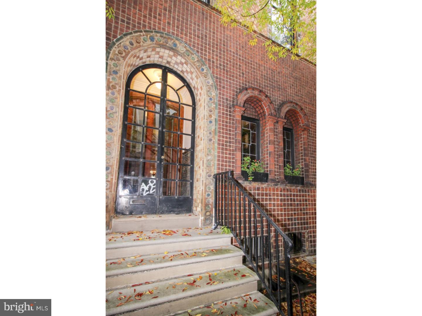 History abounds at the 'MARCEL VITI HOUSE'. The details in this 1870's townhouse tells its unique tale. With only 3 owners in nearly 150 years, this is a rare chance to own a charming piece of Center City history. This 4 bedroom, 2.5 bath home boasts 7 fireplaces (3 closed), hardwood flooring and tile through living space and details and exquisite mill work galore! The front of this home is adorned with tile from the Moravian Tile Works overseen by Mr. Mercer crafted in Doylestown over a century ago. Enter into the formal parlor, then leads to the formal dining room with dumb waiter from kitchen. There is a Butlers pantry and office. The staircase is circular and wraps from the first floor to the 4 floor with a bright a cheery skylight to enhance the stairwell, the center is open from the 1st to 4th floors.. The second level has the formal Library with fireplace, leaded glass bay windows, incredible hand carved mill work and hardwood floors. Also the master bedroom and bathroom on this floor. The 3rd floor has two generous bedrooms and a full bath., the 4th floor has the 4th bedroom, a large sealed storage room and utility room with the heater & air handler. The lower level is the kitchen with butcher block counter tops, 2 sinks, dishwasher, oven and the dumb waiter, The kitchen has ceramic tile floors. This level also has the laundry room, powder room and a utility room/work room with workbench. The entire wall of glass opens to rear 3 level outside space. There is a brick patio, exquisite gardens and an 2nd elevated brick patio. There is a new stone retaining wall build 2 years ago. The current owners have occupied this home since the 1960's and the pride in ownership shows. Although updating is required throughout, the home has been lovingly maintained throughout the years. This home enjoys a very large rear yard uncommon in most center city homes. The mansion is close to Fitler Square, just 3 blocks away. Rittenhouse Square , 4 blocks away the Schuylkill River Trail is just 4 blocks away as well. There are three grocery stores (Trader Joe's, Rittenhouse Market, South Street Market) just blocks away, also a Walgreen's and a CVS,close by. Many restaurants are also in walking distance.. You can walk to the Academy of Music and many other musical venues, This one will be a showstopper. Please read the attached Bio on Mr Veti, Swedish Vice-Council, whom also was instrumental in getting Italy to donate a new fountain to the Philadelphia's Art Museum for the city's 150th Birthday Celebration. Just steps from Rittenhouse Square, restaurants, cafes and quaint shops surround you. Besides the prime location, this home is located in the sought after Blue Ribbon Award Winning Greenfield Elementary School catchment.