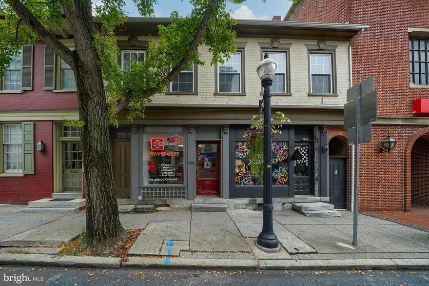 Welcome to 106-108 E. King Street! This historic commercial property is located in the heart of downtown Lancaster, directly across from the Lancaster County Courthouse and just a short walk to Annie Bailey’s. Built in the 1700s, the building is solid, full of character, and brimming with potential. It features two tenant-occupied storefronts (approximately 1,300 SF and 900 SF), a vacant back room overlooking the private courtyard, and a 1,300± SF office space on the second floor that could potentially be converted into an apartment with city approval. Being sold as-is, this rare property is ready for your finishing touches to make it your own. With its blend of history, charm, and income potential, it is a unique investment opportunity in Lancaster City’s thriving core. OWNER FINANCING AVAILABLE FOR QUALIFIED BUYERS. Owner willing to finance 70%.