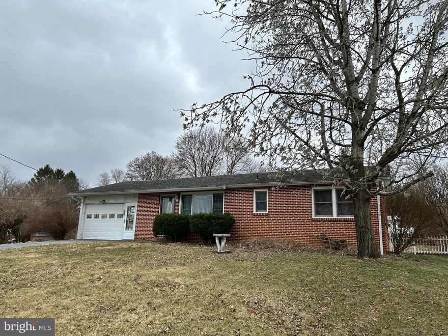 Beautiful ranch home with fenced yard area and 1 car garage. Lots of natural light in the garage makes it perfect for dual usage as a sunroom and/or picnic area.  Inside you will find 3 generous bedrooms, hardwood floors, and updated kitchen with lots of cabinetry.  Added bonus of  a large family room in lower level. with an office area too. All furnishings are negotiable making this property perfect for someone who needs a fresh start! Call for your tour today.