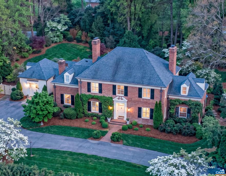 If it is in Charlottesville, Virginia, who doesn't love a classic, Flemish Bond brick, copper & slate Georgian located on one of the city's most beautiful, quiet residential streets yet in walking distance to Downtown, the University & Barracks Road shopping & conveniences? This incredibly well constructed & true period home dates to the 1930's, like its distinguished neighbors. Look forward to entertaining guests in the graciously proportioned living spaces & preparing family meals in the new, Karen Turner-designed kitchen & oversized butler's pantry. The current owners undertook significant renovations & an expansion w/ revered Shelter & Associates. The interiors now feature that new kitchen & butler's pantry w/ Gaston & Wyatt carpentry plus new primary & powder room baths. Further, they improved the home w/ a stunning mudroom & half bath wing designed by Bethany Puopolo. From the brick terrace & bluestone patios that wrap the back of the home, envision watching family & friends practice their sports on the private, level, back lawn. Architectural highlights incl' 4 working fireplaces inside as well as 1 outside for social gatherings, high ceilings, mellowed-with-age hardwood floors & a stunning staircase w/ curving banister.,Marble Counter,Painted Cabinets,Wood Cabinets,Fireplace in Dining Room,Fireplace in Family Room,Fireplace in Living Room,Fireplace in Sun Room