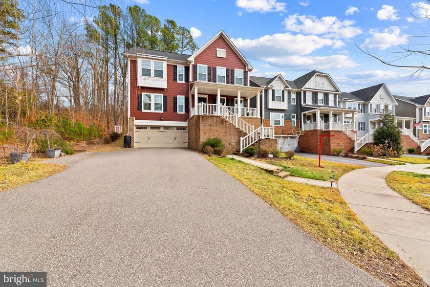 *VA ASSUMABLE 2.75% INTEREST RATE* This is your opportunity to get in at an unbeatable interest rate in Potomac Shores, a highly-desirable neighborhood with amenities such as the Jack Nicklaus golf course, community club house, fitness center, future VRE station with direct access to DC, and miles of walking / nature trails, all overlooking the idyllic backdrop of the Potomac River. With four spacious bedrooms and 3.5 bathrooms, this home is plenty big enough for a large family, or for hosting guests. Enjoy large family meals in the eat-in kitchen with granite countertops and stainless steel appliances, sip coffee in the sunroom overlooking your private backyard which backs up to acres of forests, or relax on the sofa in the enormous family room. The primary bedroom features a tray ceiling, TWO walk-in closets, and an en-suite bathroom with dual vanities, standing shower, soaker tub, and separate water closet. The basement is the perfect space for a game room, “man cave,” or home gym, and provides access to the oversized two-car garage with plenty of extra space for storage. Love the home, but not quite ready to move in just yet? No problem!! This home is currently occupied by tenants who meticulously care for the property until October 2026. It is the buyer’s choice whether to extend the lease or move-in once the current lease expires.  This is your chance to get an income-producing property NOW!”