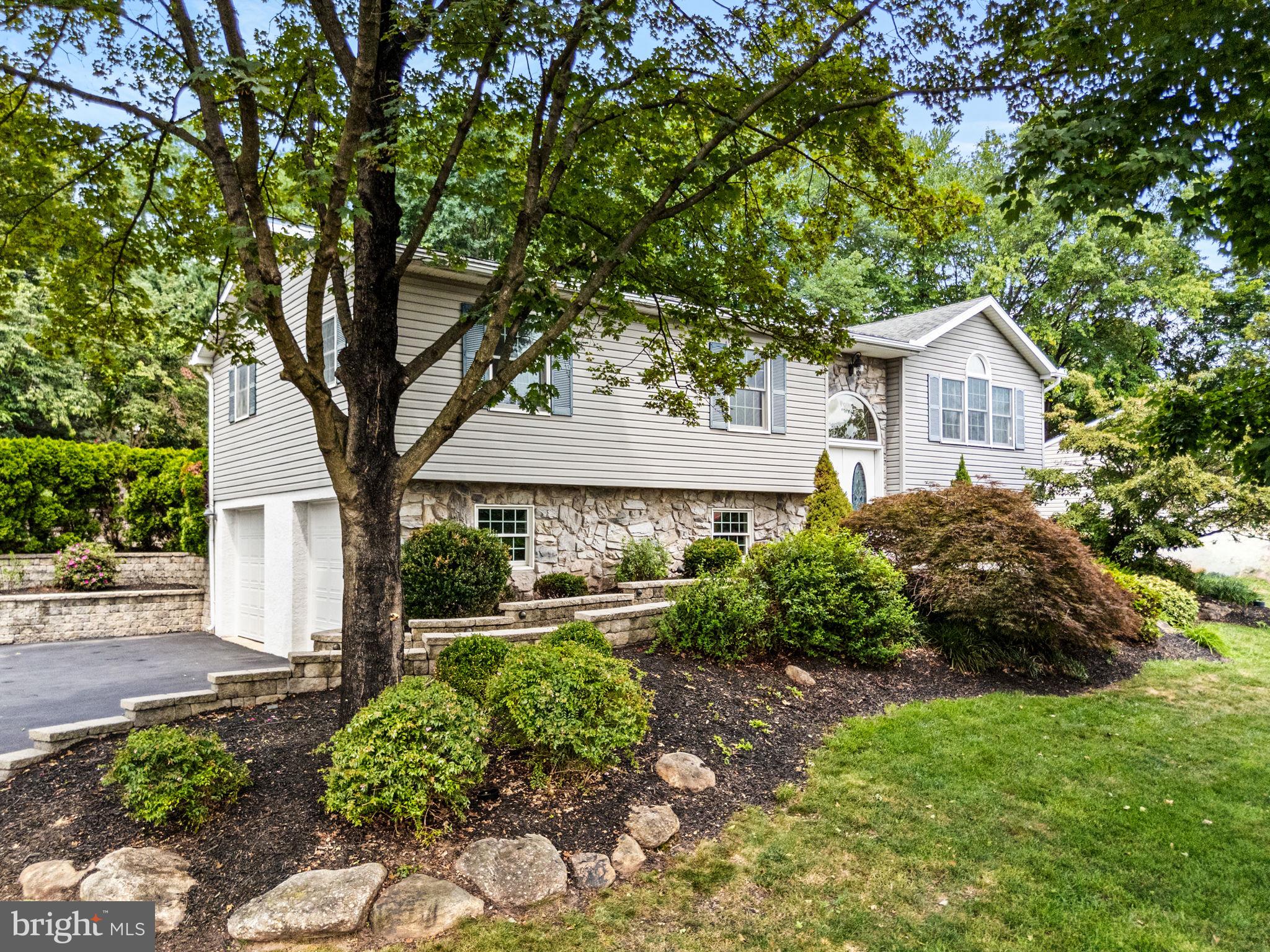 Welcome to 40 Church Rd. This wonderful 4 bedroom 3.5 bath home is set in the desirable Spring Ford School District and offers a perfect blend of comfort, functionality, and timeless style. Step inside to soaring vaulted ceilings and abundant natural light streaming through Andersen windows, creating a warm and inviting atmosphere throughout. The main level features a spacious family room with a wet bar, a stone gas fireplace, built-in bookshelves, ideal for entertaining andand opens to an exquisite paver patio, overlooking the beautifully landscaped grounds—perfect for gatherings and outdoor relaxation. The gourmet kitchen flows seamlessly to the dining room and features plenty of cabinets and stainless appliances. The master suite features an up to date bathroom , plus two additional bedrooms with hall bath complete the main floor space. The lower level is home to a terrific media room/game room, in addition there is a craft room or private office - the choice is yours. In addition the lower level features a bedroom with full bath and adjoining room that can serve as a home gym. The exterior features beautiful hardscape walkways and patio plus a deck overlooking the lush garden. Located just minutes from Lynnfield National Golf Course, shopping, dining, and major routes, this home offers an unbeatable combination of comfortability and ease of living.
Make this lovely house the place to call Home!!! Make your appointment today.