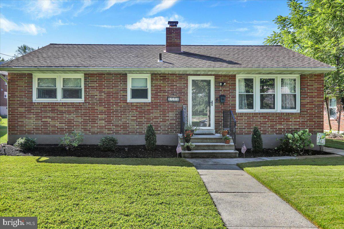 Step into comfort and charm with this delightful 3-bedroom ranch, where classic touches meet modern updates. Gleaming hardwood floors flow throughout a sunlit layout, anchored by a beautifully renovated bathroom and a sleek, contemporary kitchen ready for everyday living or weekend entertaining. Enjoy morning coffee or evening unwinding in the bright sunroom, overlooking a spacious, fully fenced yard—perfect for pets, play, or peaceful gardening. Whether you're starting out or settling down, this home offers warmth and style.