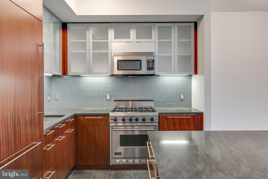 Enjoy elevated  city living in this deluxe one-bedroom, one-and-a-half-bath residence.   **Photos are from another unit with similar finishes and identical floor plan".