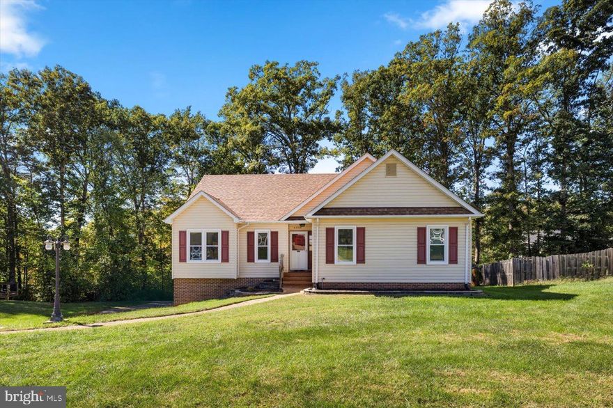 Within walking distance of the new Chancellor Crossing Shopping Center and two of Spotsylvania's highly rated schools, this raised rambler is in an advantageous location for you and your family. Immediately noticeable exterior refreshes include a new roof (2021), energy efficient windows (2024) and new garage doors (2024). Upon entering the home, you'll fall in love with the vaulted ceiling and semi-open floor plan that maximizes the living space for you and your family. Interior upgrades include refreshes in the guest bathroom (2024), hot water heater (2025), back door (2024) and refreshed paint (2025). As if .4 of an acre wasn't enough, your flat backyard boasts a 2 level deck for more space to relax or entertain. With no HOA and just minutes from I-95; the only thing missing from this home is you. Welcome Home!