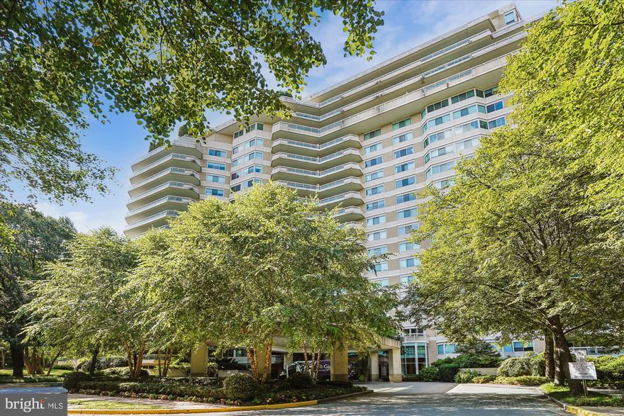 Welcome to this bright 2,064 sq ft condo featuring 2 bedrooms plus a den and 2.5 baths, all with lovely views of the trees. The home opens with a foyer that has two double closets and leads to a kitchen with a pass-through window overlooking the spacious living and dining area. There’s also a separate den and a laundry room. The primary bedroom suite includes a dressing area, a large walk-in closet, and an en-suite bath with both a tub and a shower. The second bedroom has a double closet and its own full bath with a tub and shower. Beautiful hardwood floors run throughout, with marble in the foyer and ceramic tile in the kitchen, laundry, and bathrooms. Two garage parking spaces (G1-117 and 118) and a storage unit assigned by the manager come with the sale. Enjoy elegant, resort-style living in Friendship Heights’ most luxurious complex, set on more than 17 acres. This gated community offers a gatehouse, 24-hour security, beautifully landscaped grounds, and walking paths. Residents can use tennis courts and a three-story clubhouse with indoor and outdoor pools supervised by lifeguards, party rooms, a modern gym, racquetball, billiards, ping pong, and aerobics rooms. The amenities are truly endless. Plus, you’re just a short walk from shops, grocery stores, restaurants, and the Friendship Heights Metro station.
