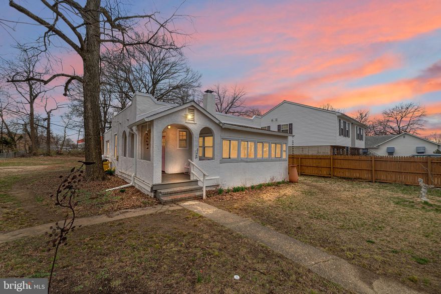 Fully fenced in yard with picket fence, great for pets or your dream garden! Welcome to 5123 Crittenden Street, a Spanish style 2 bedroom home with mature trees and tucked away in a quiet neighborhood.  Freshly painted throughout, this cozy home features a fully renovated kitchen with unique green cabinets and stainless steel appliances including a gas stove.  Enjoy your morning coffee on the covered front porch while you overlook the front gardens filled with mature trees (one pecan tree) and native plants.  Entering in to the living room, you have direct access into the separate dining area right off the kitchen.  On the front of the home is the sunroom, great for an additional bedroom or office space. .  Hardwood floors throughout, this home offers 2 bedrooms on opposite sides of the property, one near the front living room and one in the back of the property, with a seating area in front of the bedroom.  A stacked washer and dryer near the backdoor in the laundry room and additional storage out back in the brand new shed.  The backyard is a great space for entertaining on the patio, a private area to enjoy the warm Summer days. 
Pets considered case by case with deposit. A block away from to the Anacosita Bike Trail, 1.5 miles from downtown Hyattsville and downtown Riverdale including the #1 best BBQ spot in all of Maryland, 2Fifty Texas BBQ.  No smoking allowed. Tenant is responsible for all utilities (gas, water, electricity, cable/internet) and lawn maintenance. Lawn care tools are available for renter including lawn mower. Renters insurance required.